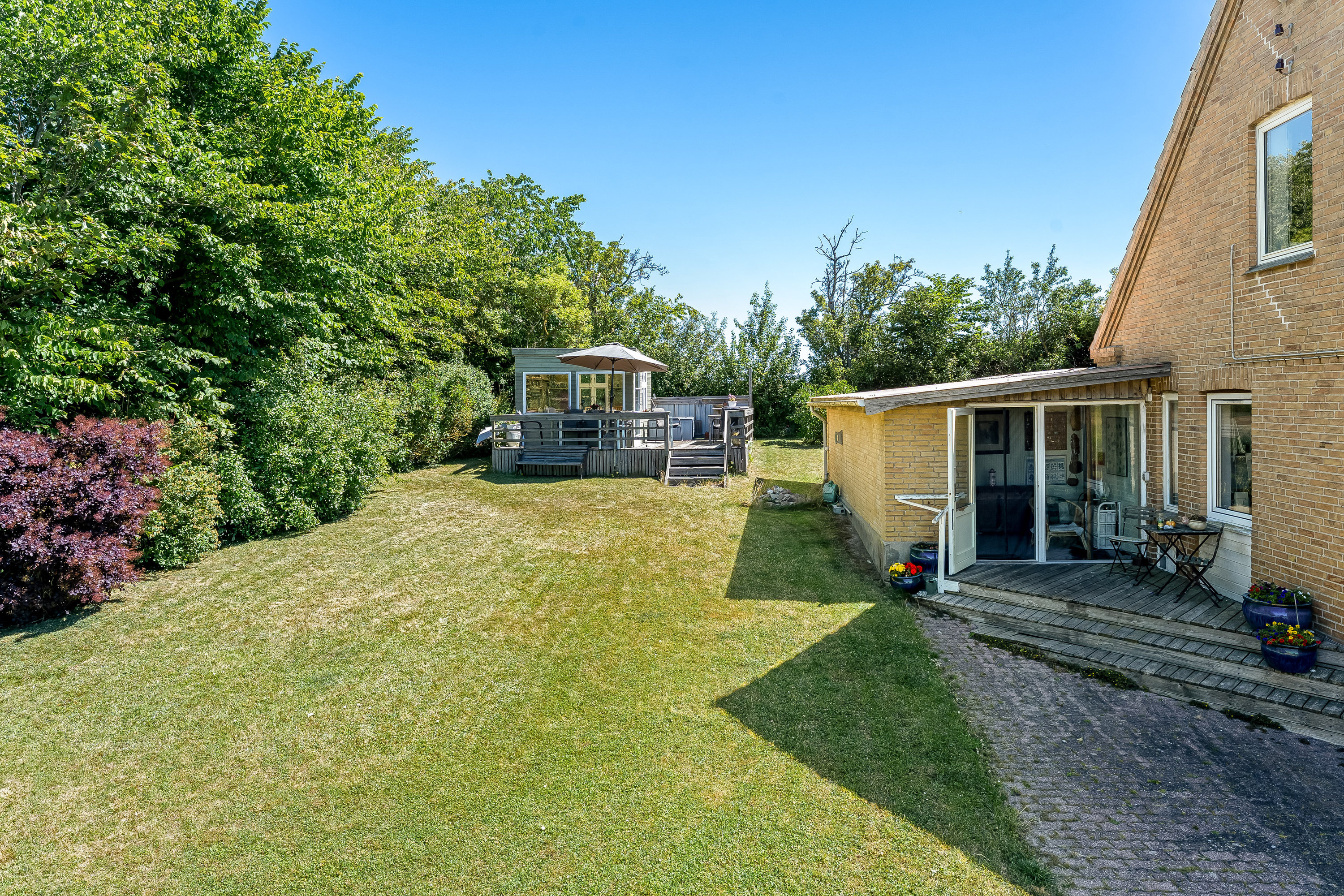 Fremhævet facade billede i fuldskærmstilstand. Billede af Askhavnsvej 16, 4945 Femø