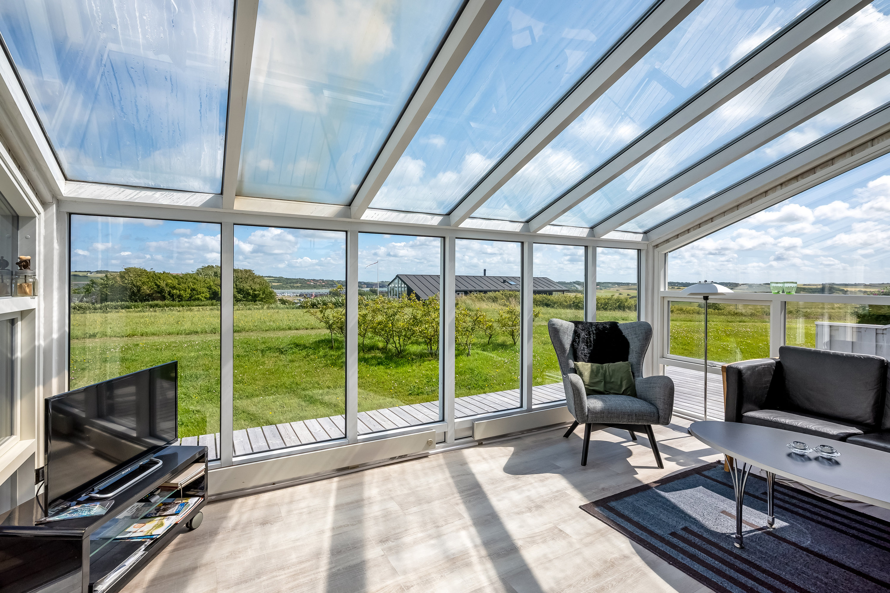 Fremhævet stue billede i fuldskærmstilstand. Billede af Gyvelvej 8, Tørring, 7620 Lemvig