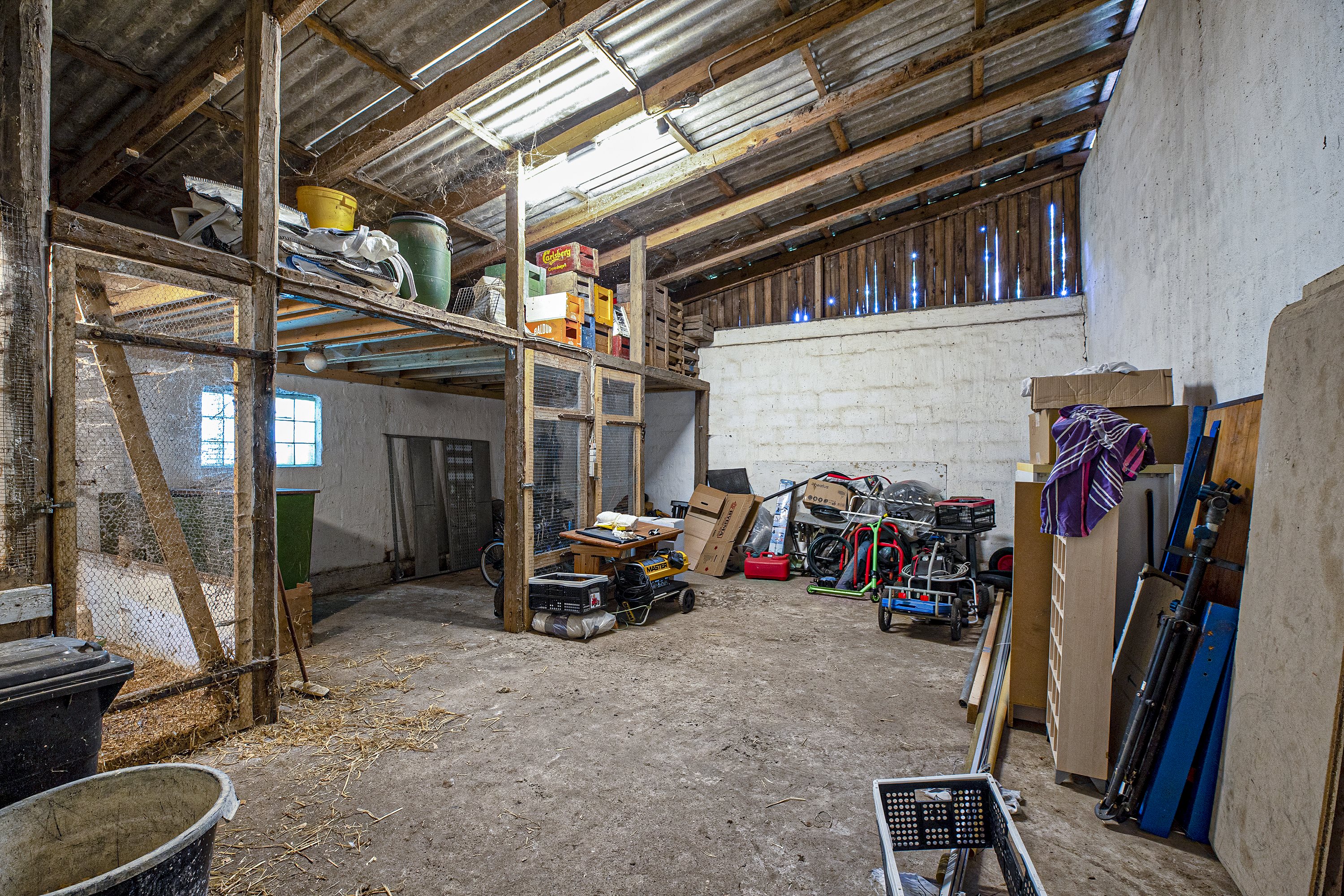 Fremhævet garage billede i fuldskærmstilstand. Billede af Søen 1 & 3, Lysabildskov, 6470 Sydals