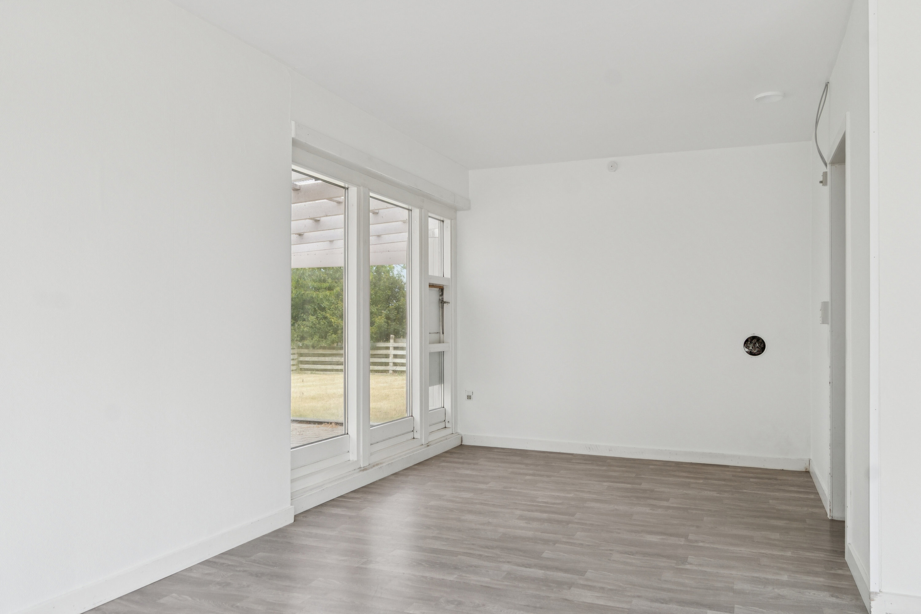 Fremhævet stue billede i fuldskærmstilstand. Billede af Roskildevej 20, 3650 Ølstykke