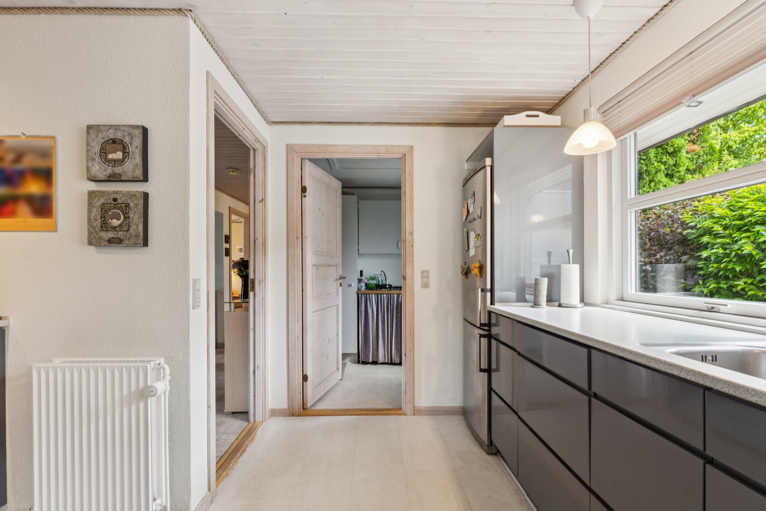 Fremhævet køkken billede i fuldskærmstilstand. Billede af Åsumvej 129, 5240 Odense NØ