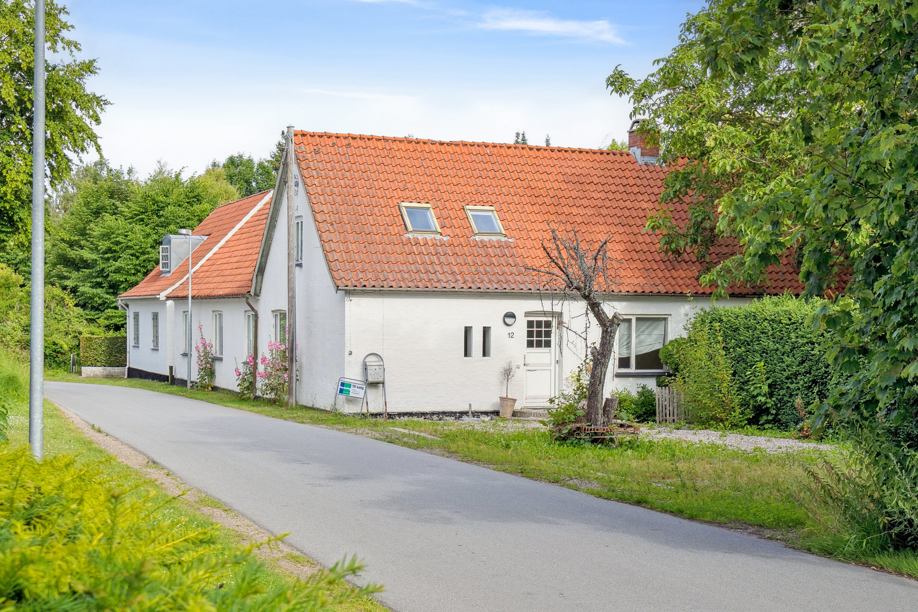 Fremhævet set fra vejen billede i fuldskærmstilstand. Billede af Kirkevænget 12, Holme-Olstrup, 4684 Holmegaard