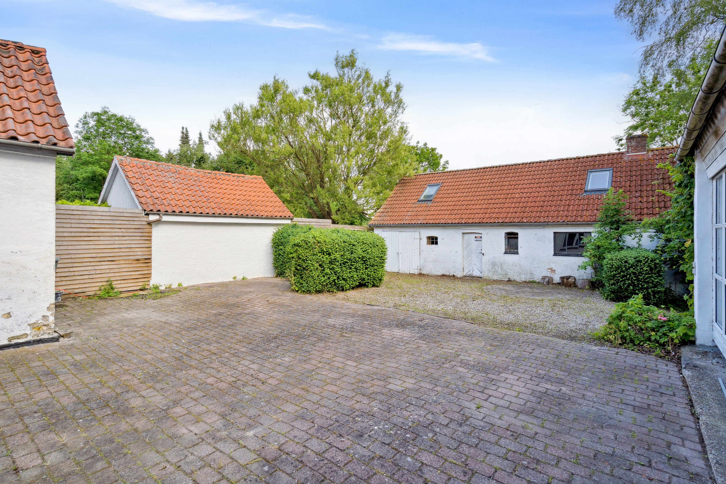 Fremhævet set fra vejen billede i fuldskærmstilstand. Billede af Kirkevænget 12, Holme-Olstrup, 4684 Holmegaard