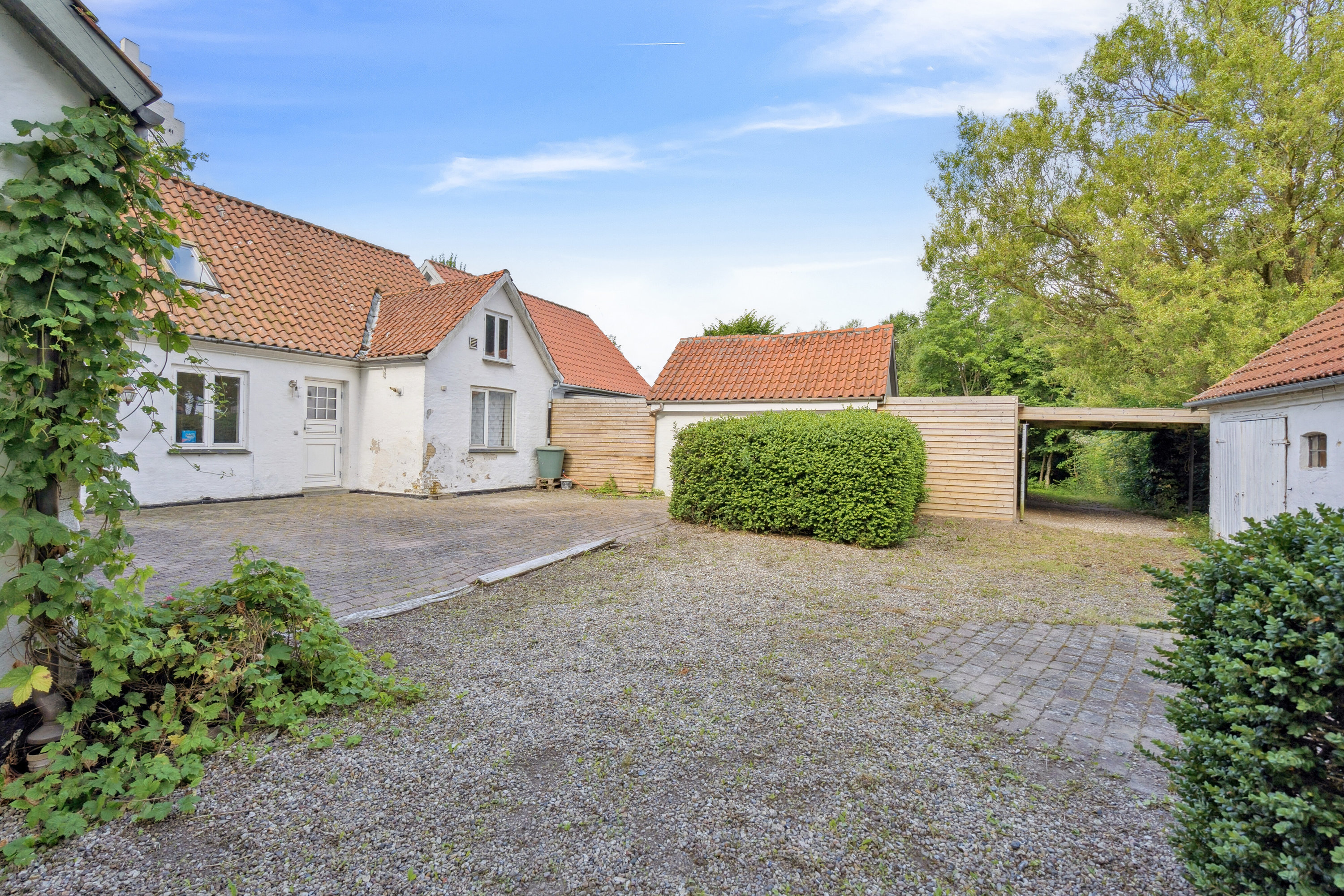 Fremhævet set fra vejen billede i fuldskærmstilstand. Billede af Kirkevænget 12, Holme-Olstrup, 4684 Holmegaard