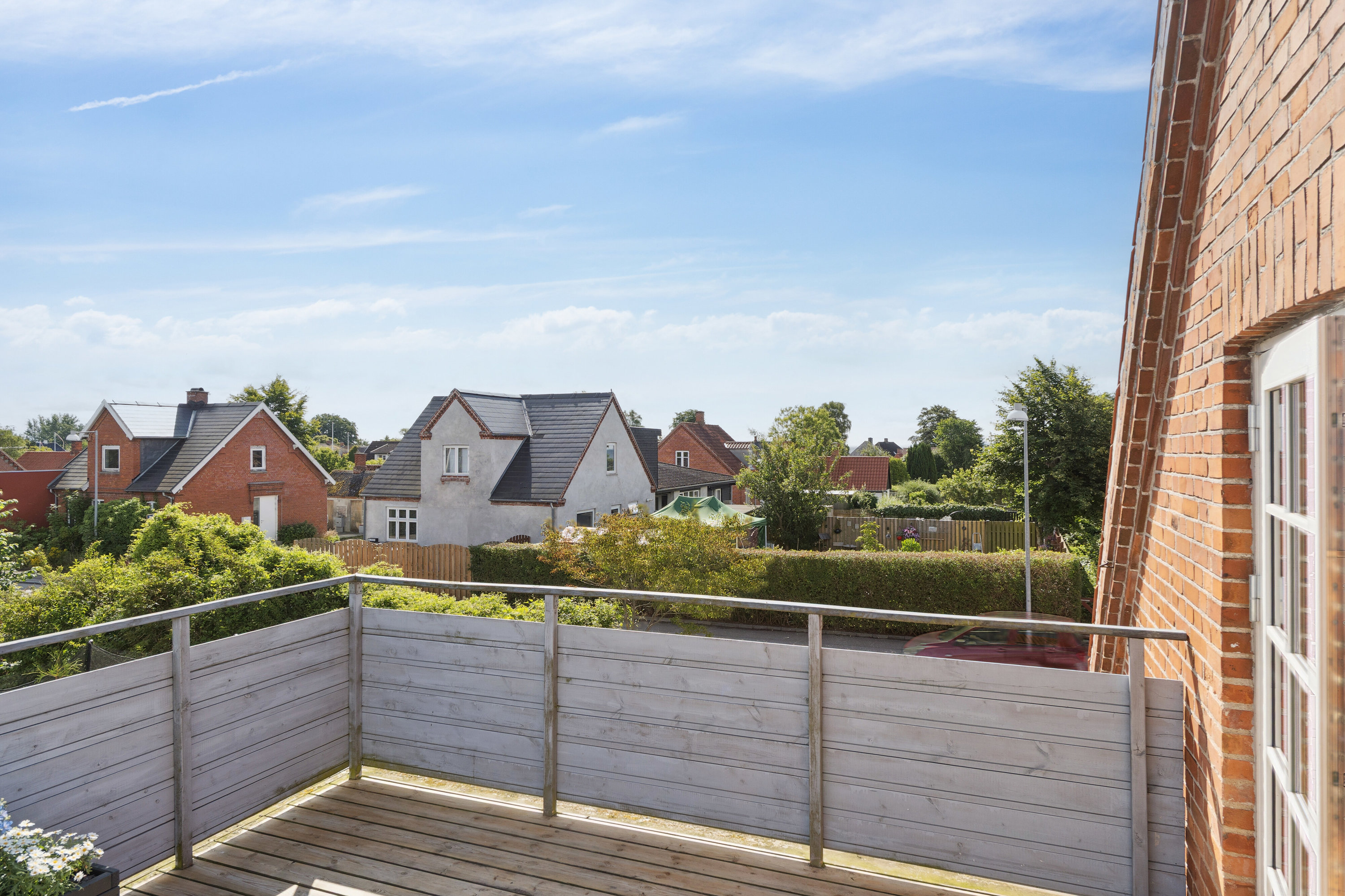 Fremhævet altan billede i fuldskærmstilstand. Billede af Hovedgaden 51A, 4654 Faxe Ladeplads