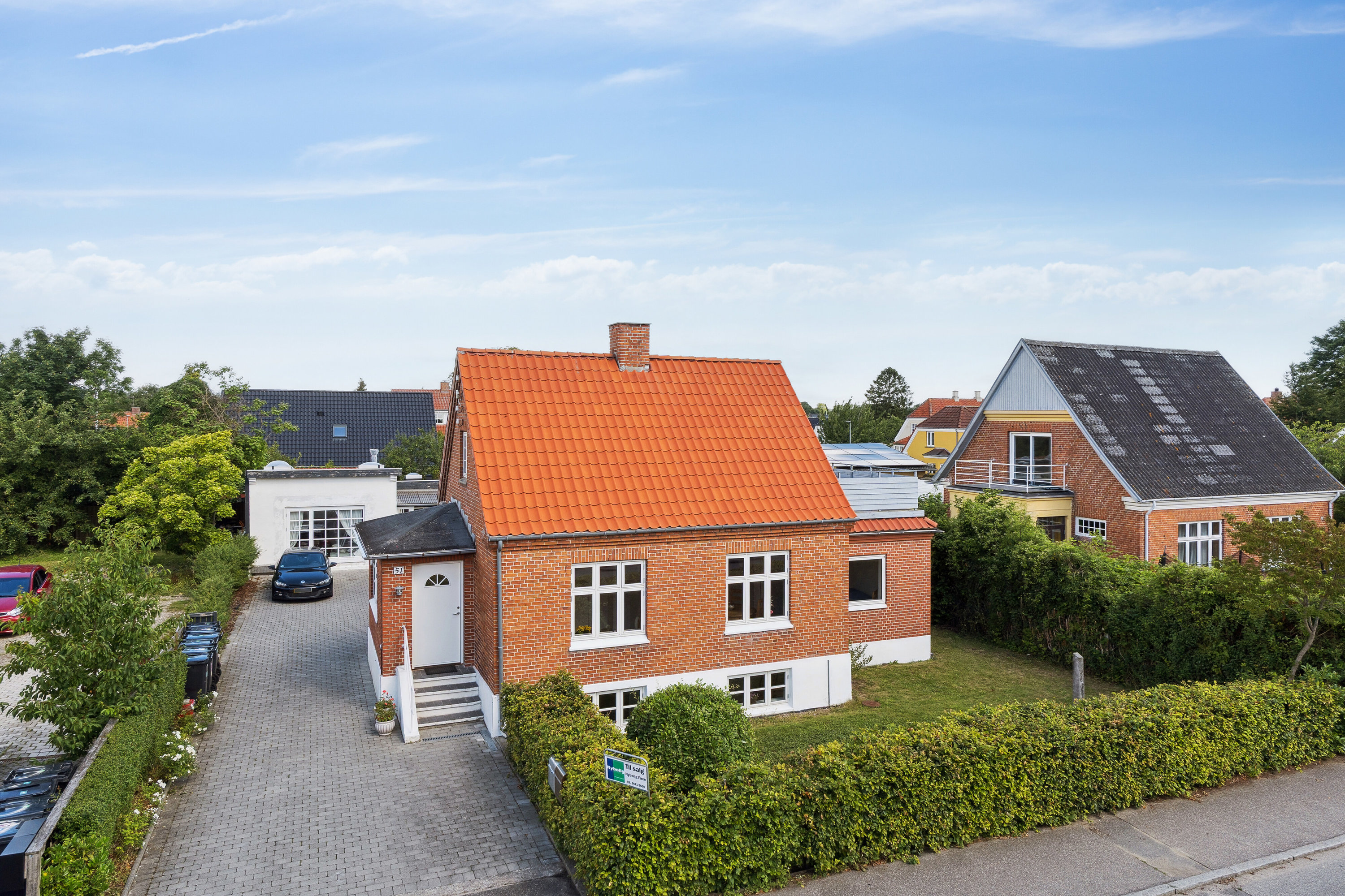 Fremhævet set fra vejen billede i fuldskærmstilstand. Billede af Hovedgaden 51A, 4654 Faxe Ladeplads