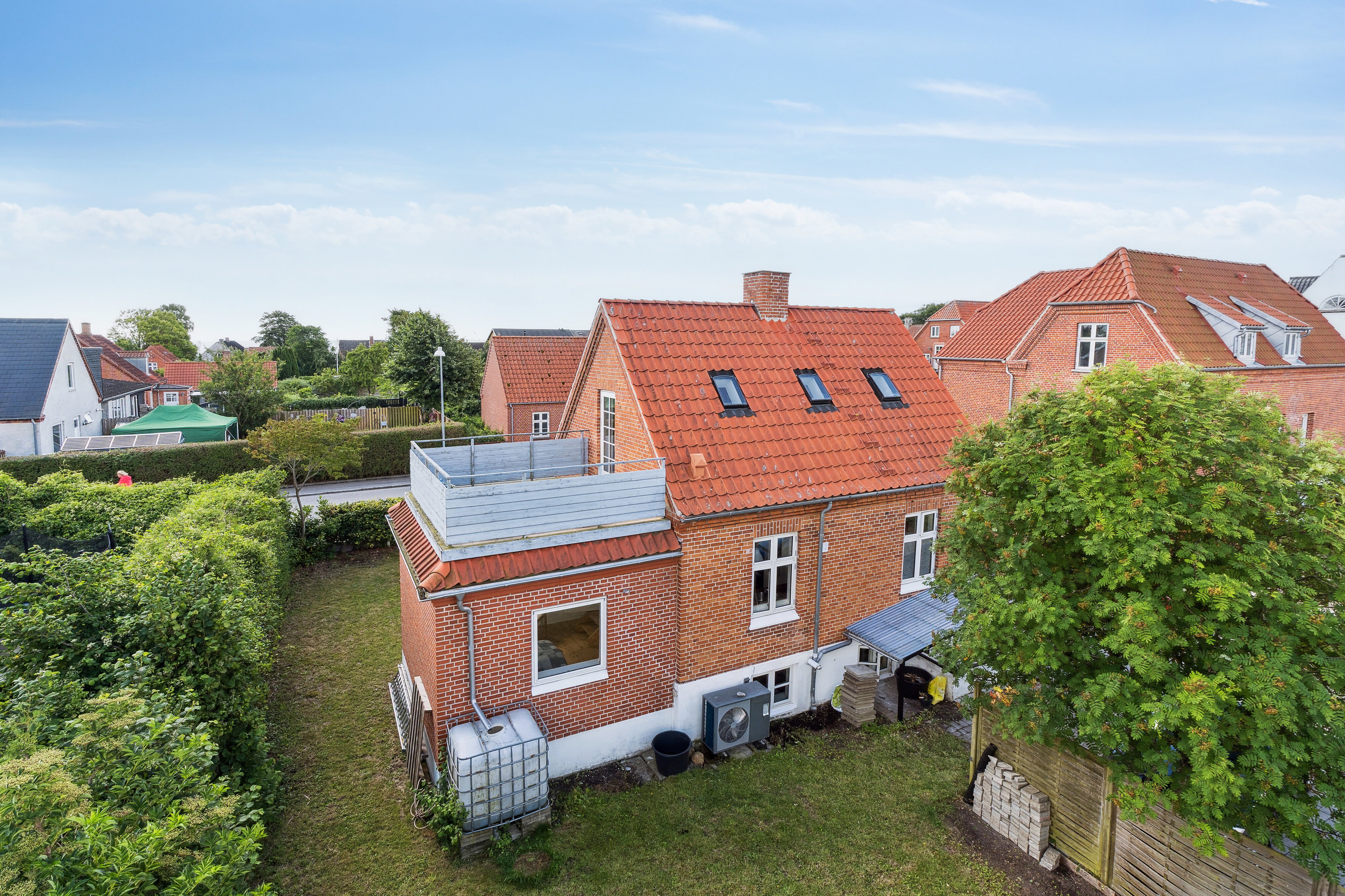 Fremhævet set fra haven billede i fuldskærmstilstand. Billede af Hovedgaden 51A, 4654 Faxe Ladeplads