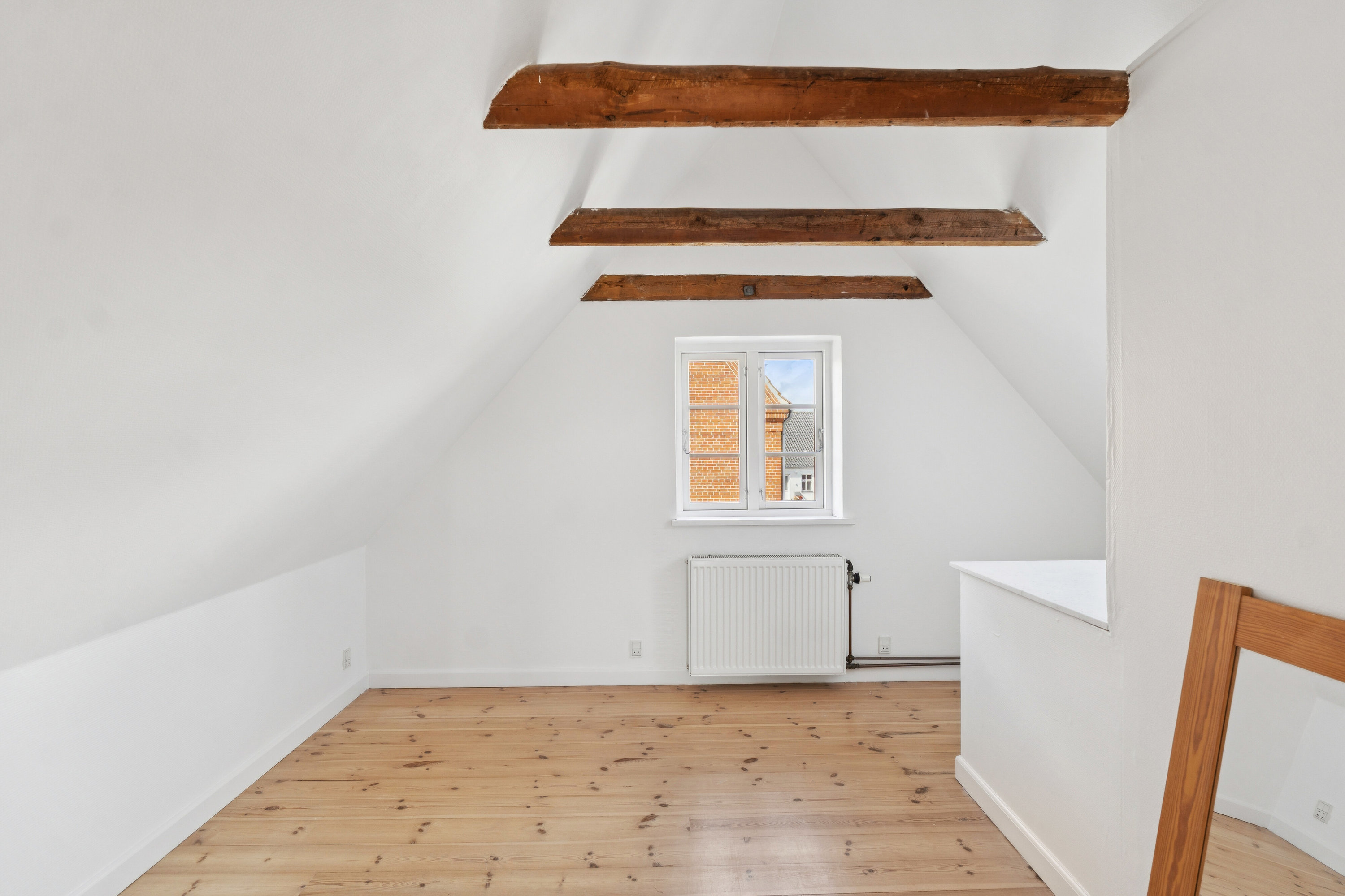 Fremhævet indendørs billede i fuldskærmstilstand. Billede af Hovedgaden 51A, 4654 Faxe Ladeplads