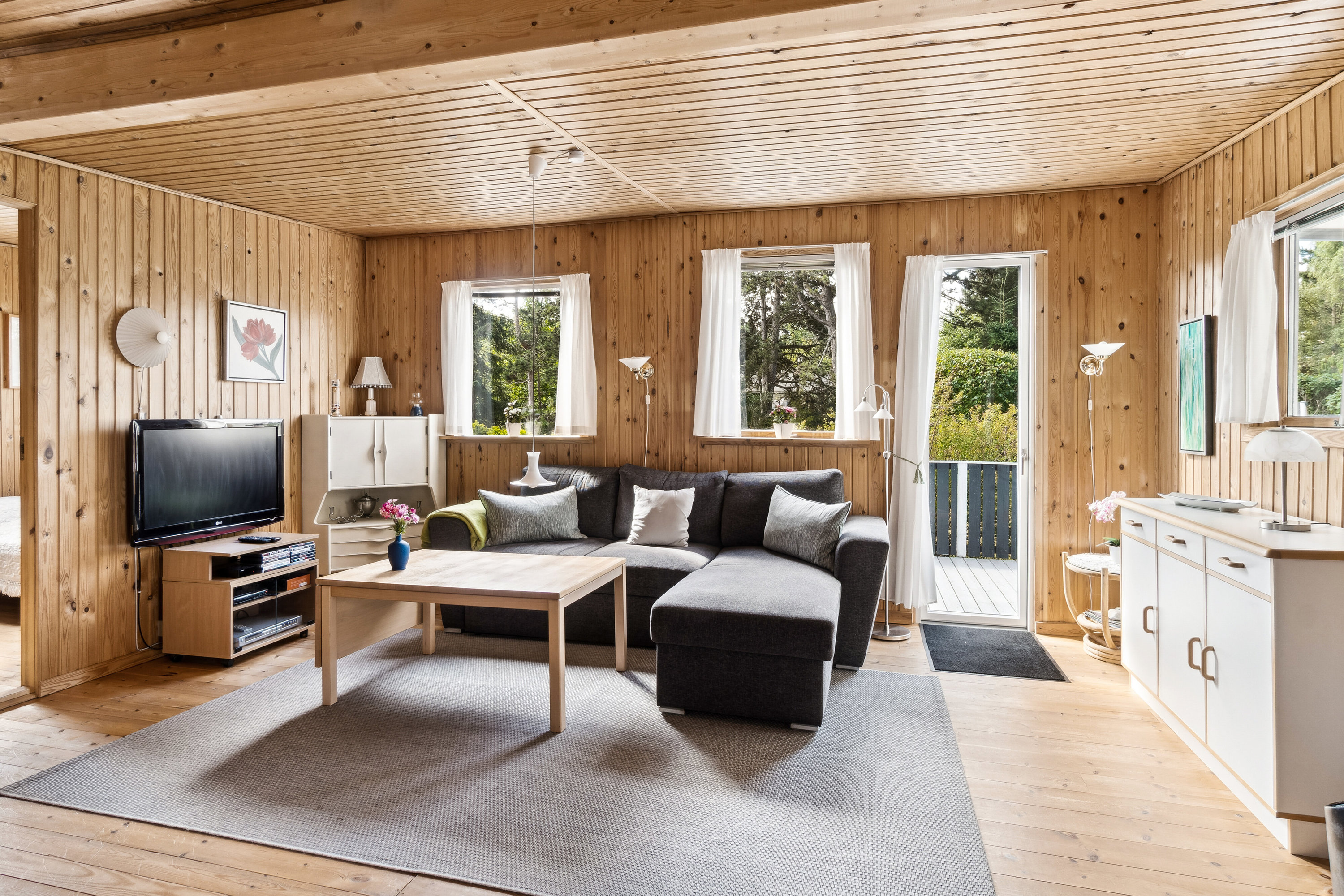 Fremhævet stue billede i fuldskærmstilstand. Billede af Odinsvej 3A, 4500 Nykøbing Sj