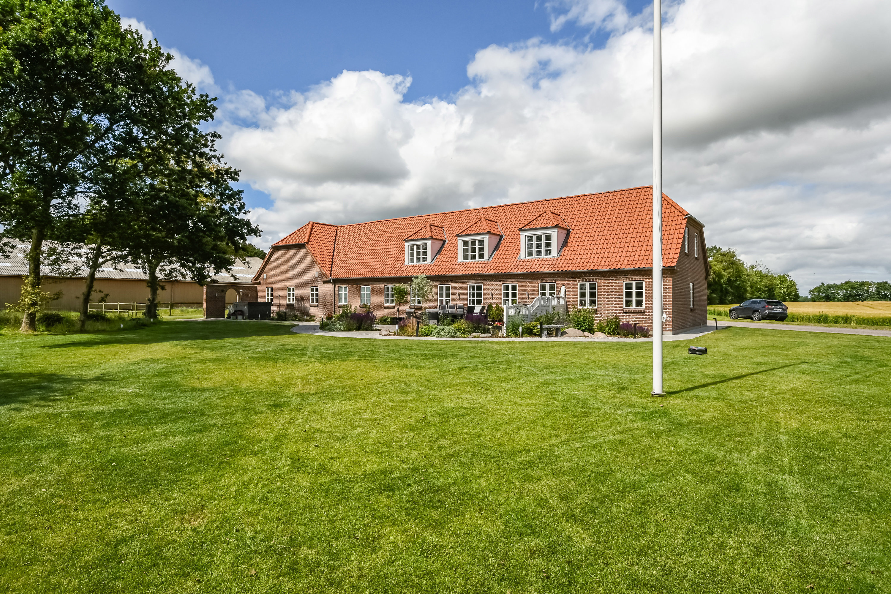 Fremhævet ejendommen billede i fuldskærmstilstand. Billede af Holmvej 1, 6990 Ulfborg