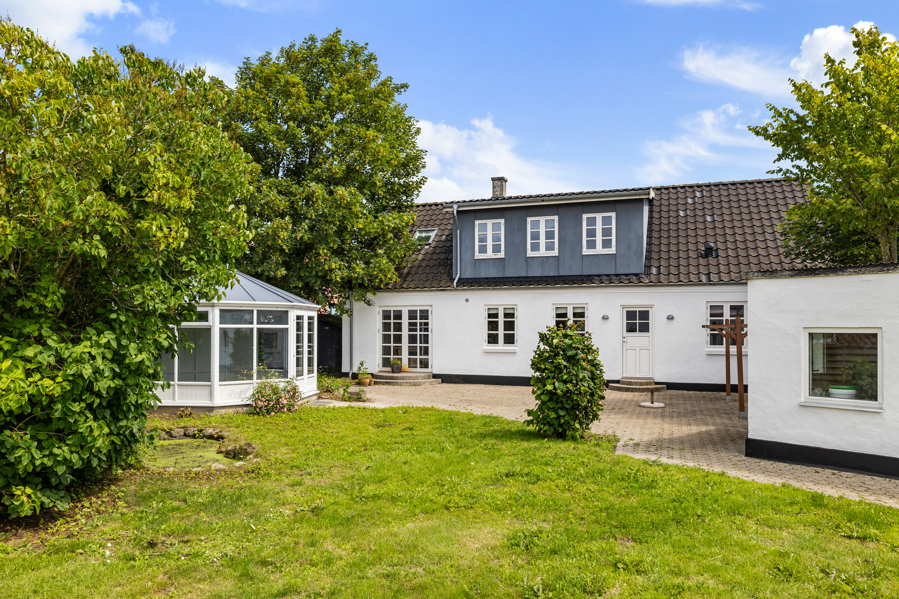 Fremhævet have billede i fuldskærmstilstand. Billede af Højskolevej 2A, 9760 Vrå