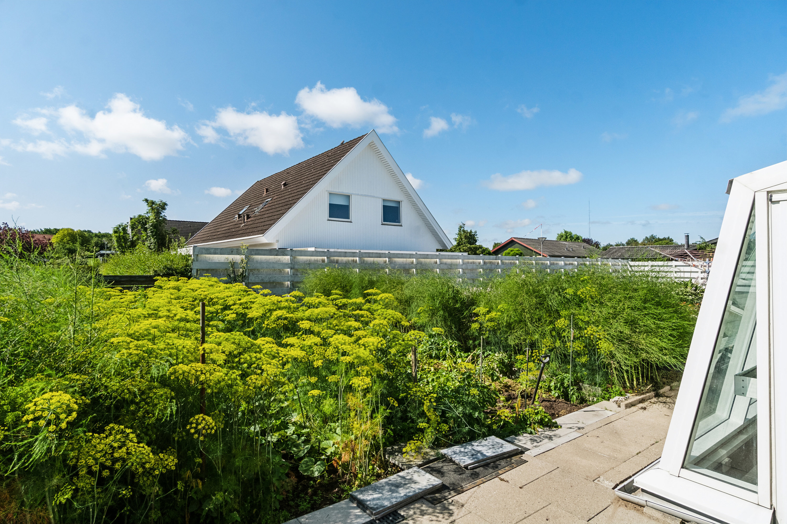 Fremhævet set fra haven billede i fuldskærmstilstand. Billede af Blichersvej 4, 4500 Nykøbing Sj