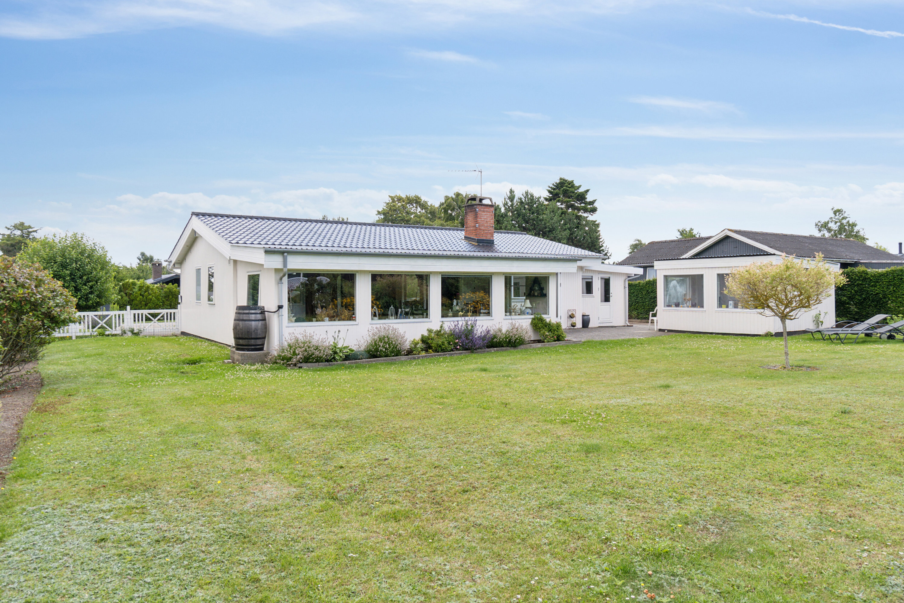 Fremhævet set fra haven billede i fuldskærmstilstand. Billede af Sortmejsevej 6, Ll Kongsmark, 4200 Slagelse