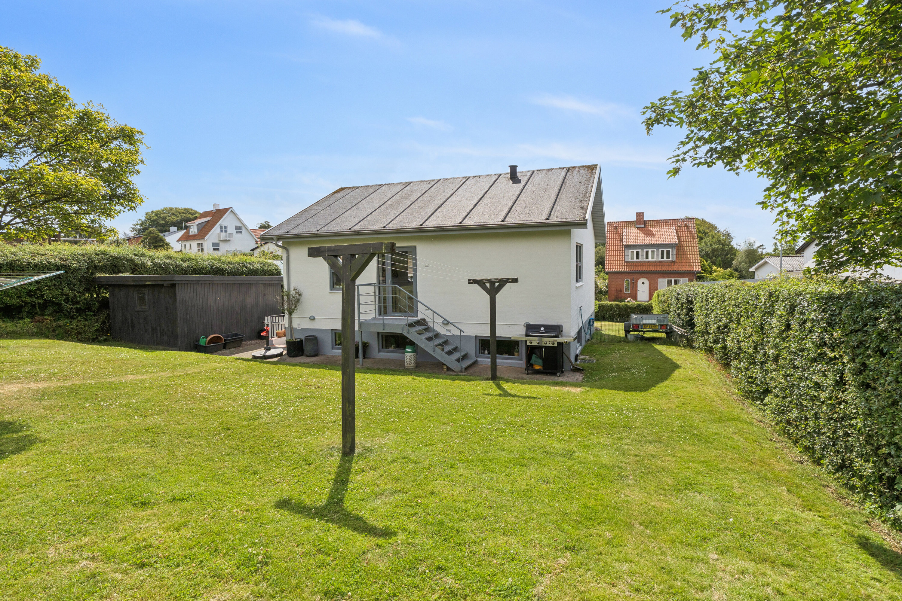 Fremhævet set fra haven billede i fuldskærmstilstand. Billede af Aldershøjvej 26, 9800 Hjørring