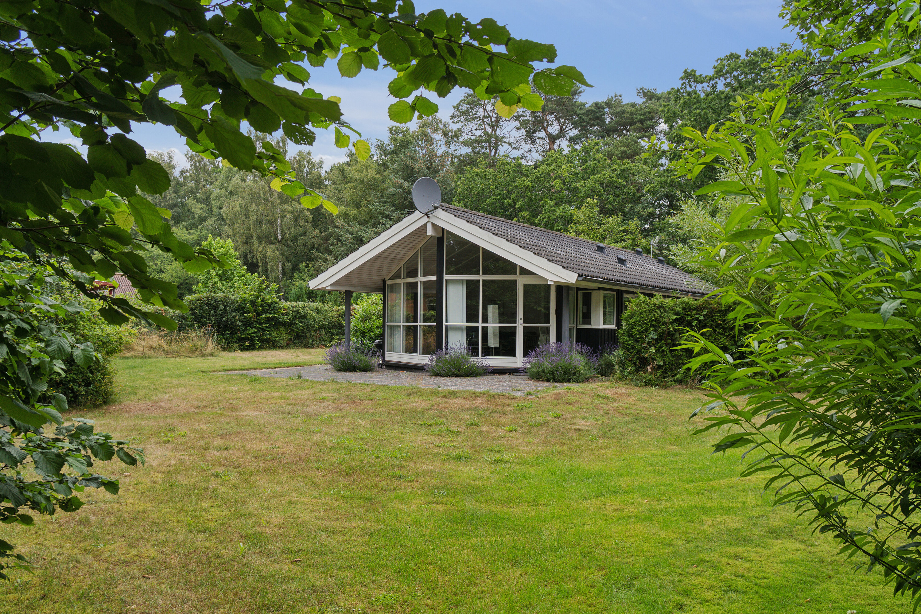 Fremhævet set fra haven billede i fuldskærmstilstand. Billede af Toftegårdsvej 34C, Hasle, 3790 Hasle