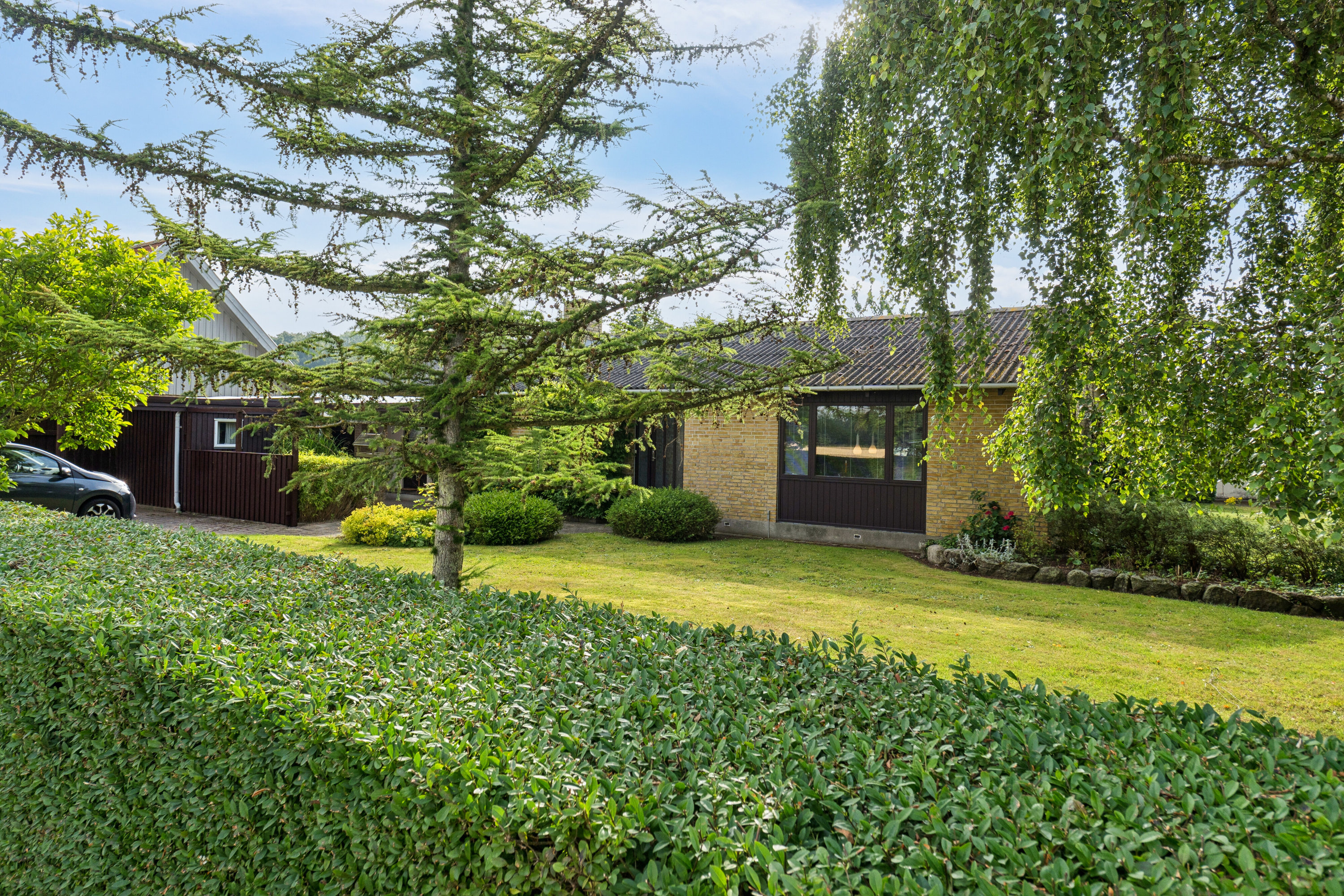 Fremhævet udendørs billede i fuldskærmstilstand. Billede af Strøbyvej 35, Østrup, 5450 Otterup