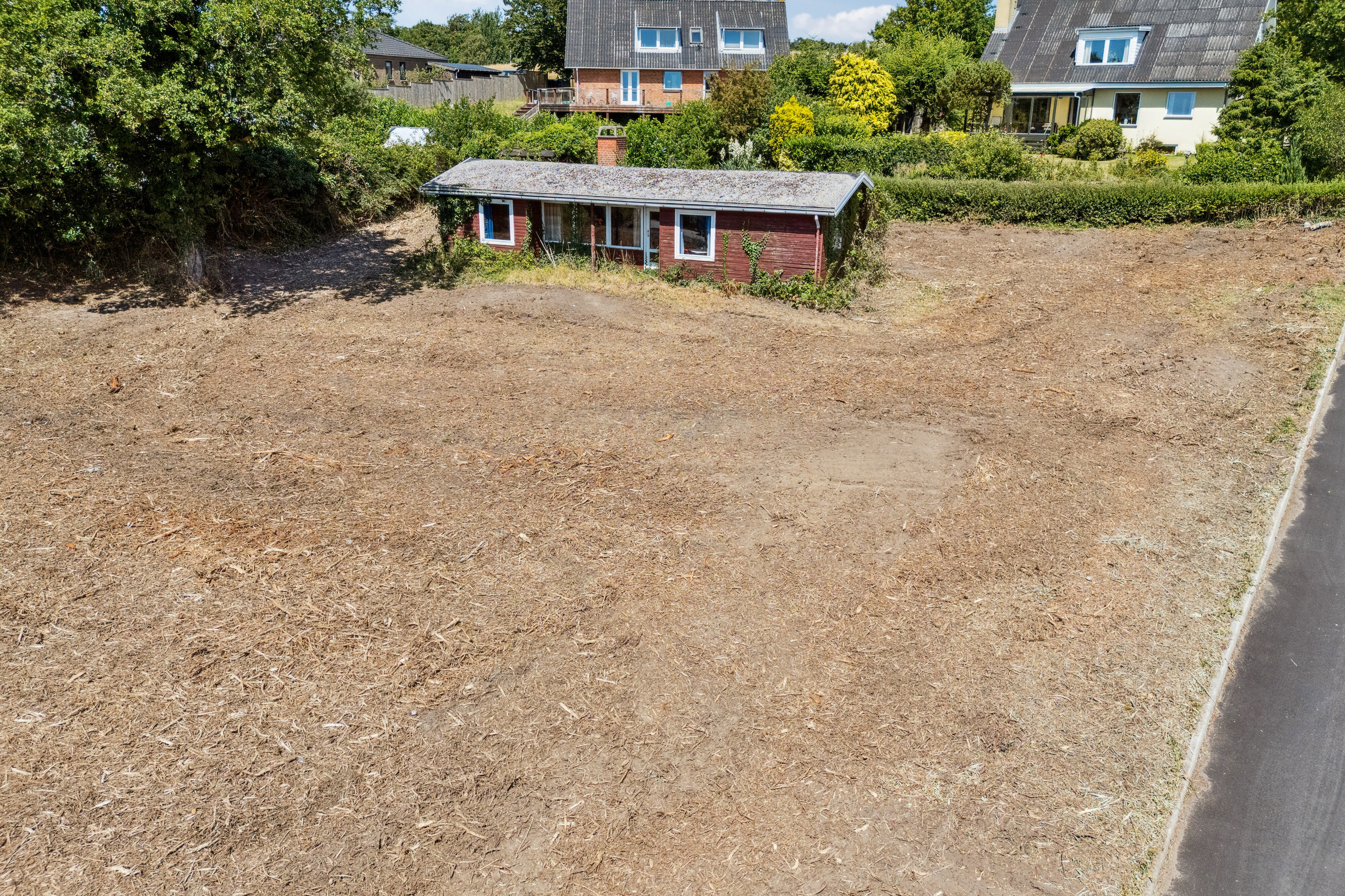 Fremhævet set fra haven billede i fuldskærmstilstand. Billede af Bakkedalsvej 3, 4400 Kalundborg