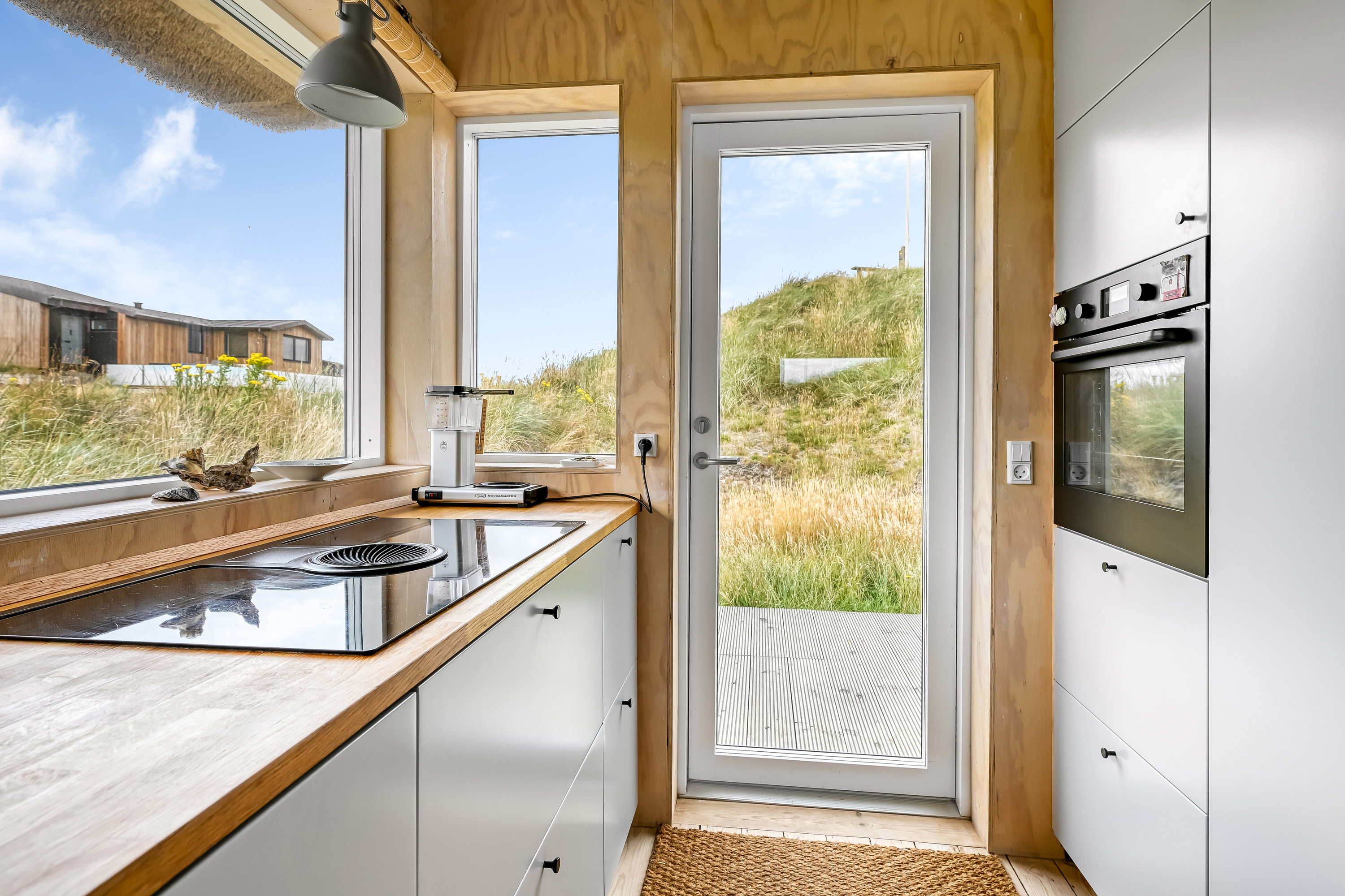 Fremhævet køkken billede i fuldskærmstilstand. Billede af Slunden 110, Rindby Strand, 6720 Fanø