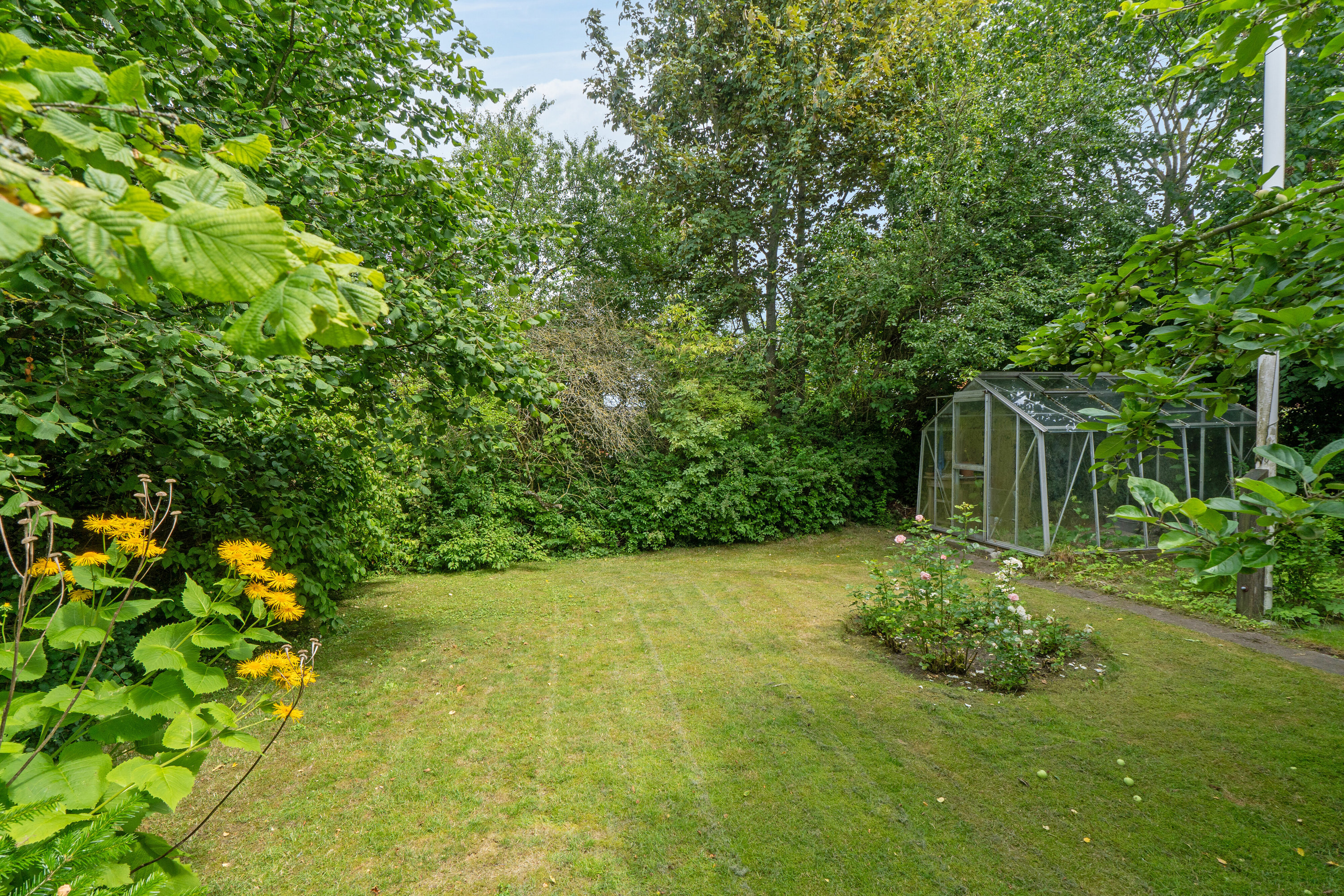 Fremhævet set fra haven billede i fuldskærmstilstand. Billede af Moltkesvej 37, 4690 Haslev