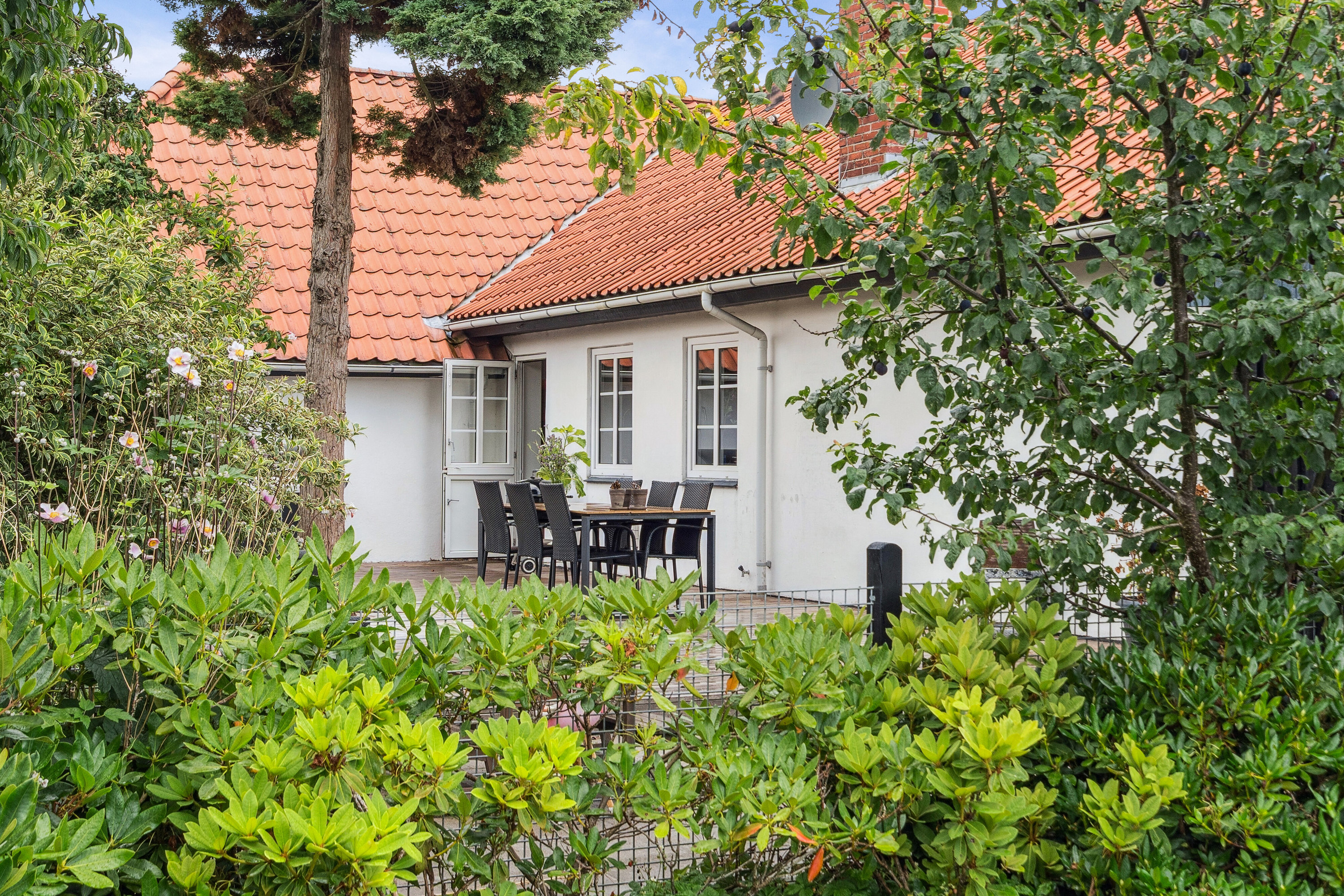 Fremhævet set fra haven billede i fuldskærmstilstand. Billede af Lintrupvej 78, Hjerting, 6630 Rødding