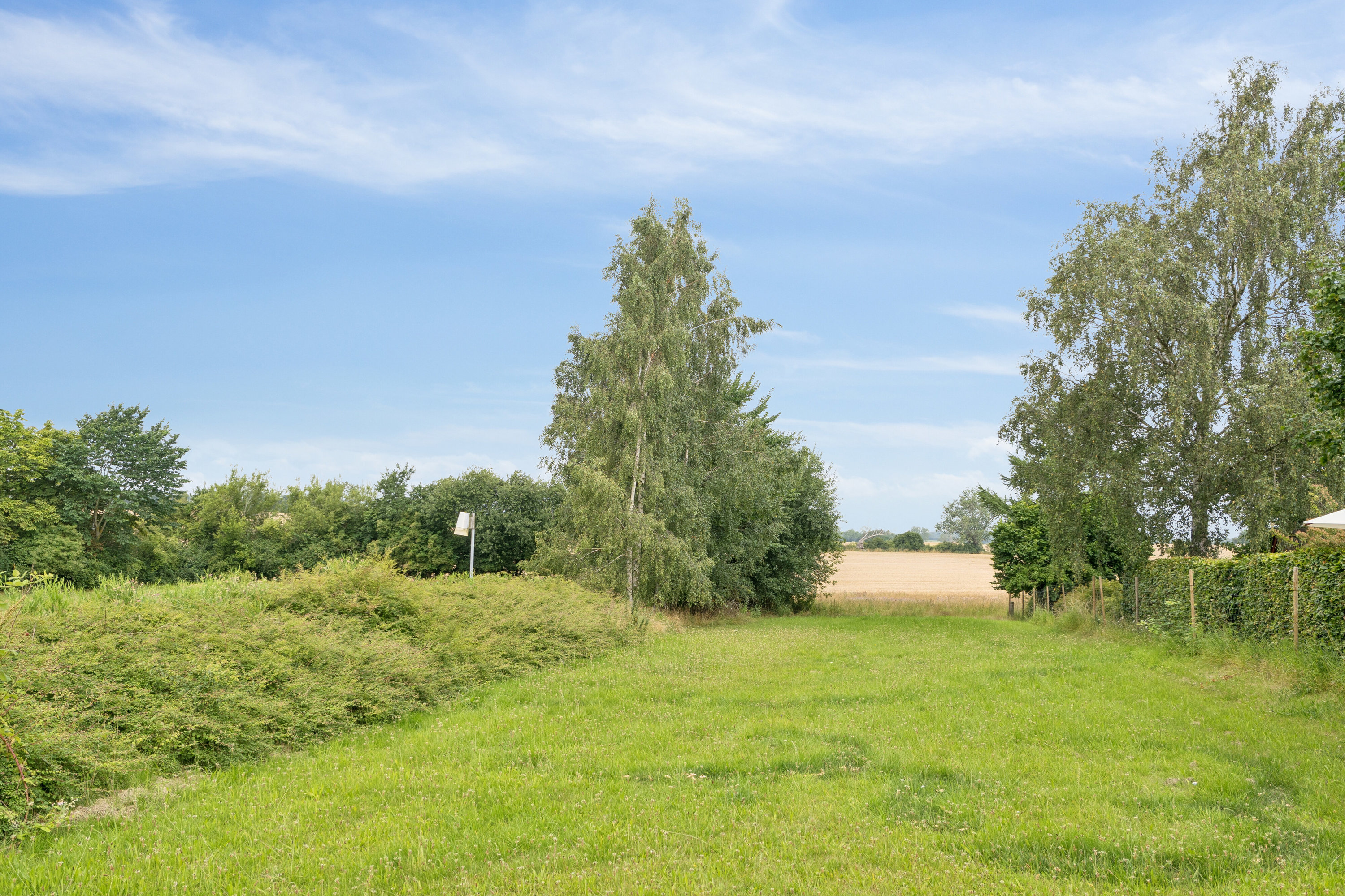 Fremhævet set fra haven billede i fuldskærmstilstand. Billede af Smidstrupvej 55, 4720 Præstø