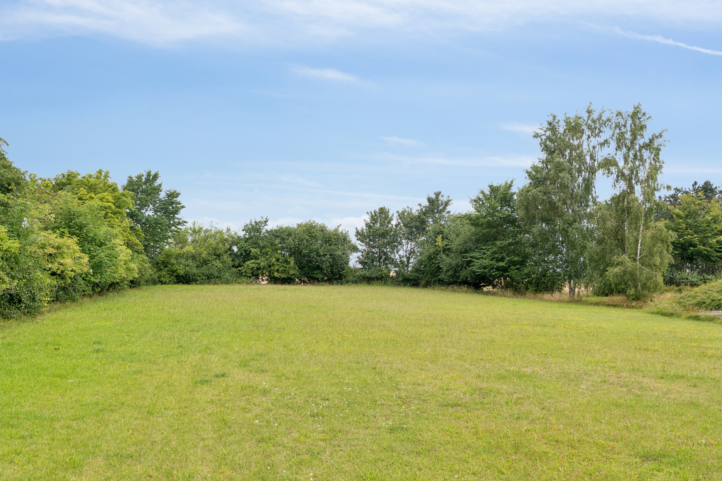 Fremhævet set fra haven billede i fuldskærmstilstand. Billede af Smidstrupvej 55, 4720 Præstø