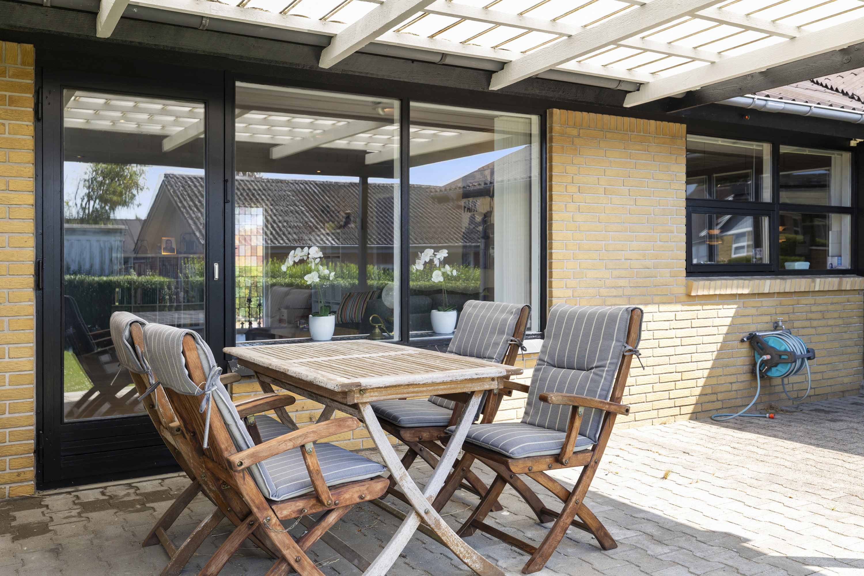 Fremhævet overdækket terrasse billede i fuldskærmstilstand. Billede af Præstegårdsvej 21, Gærum, 9900 Frederikshavn