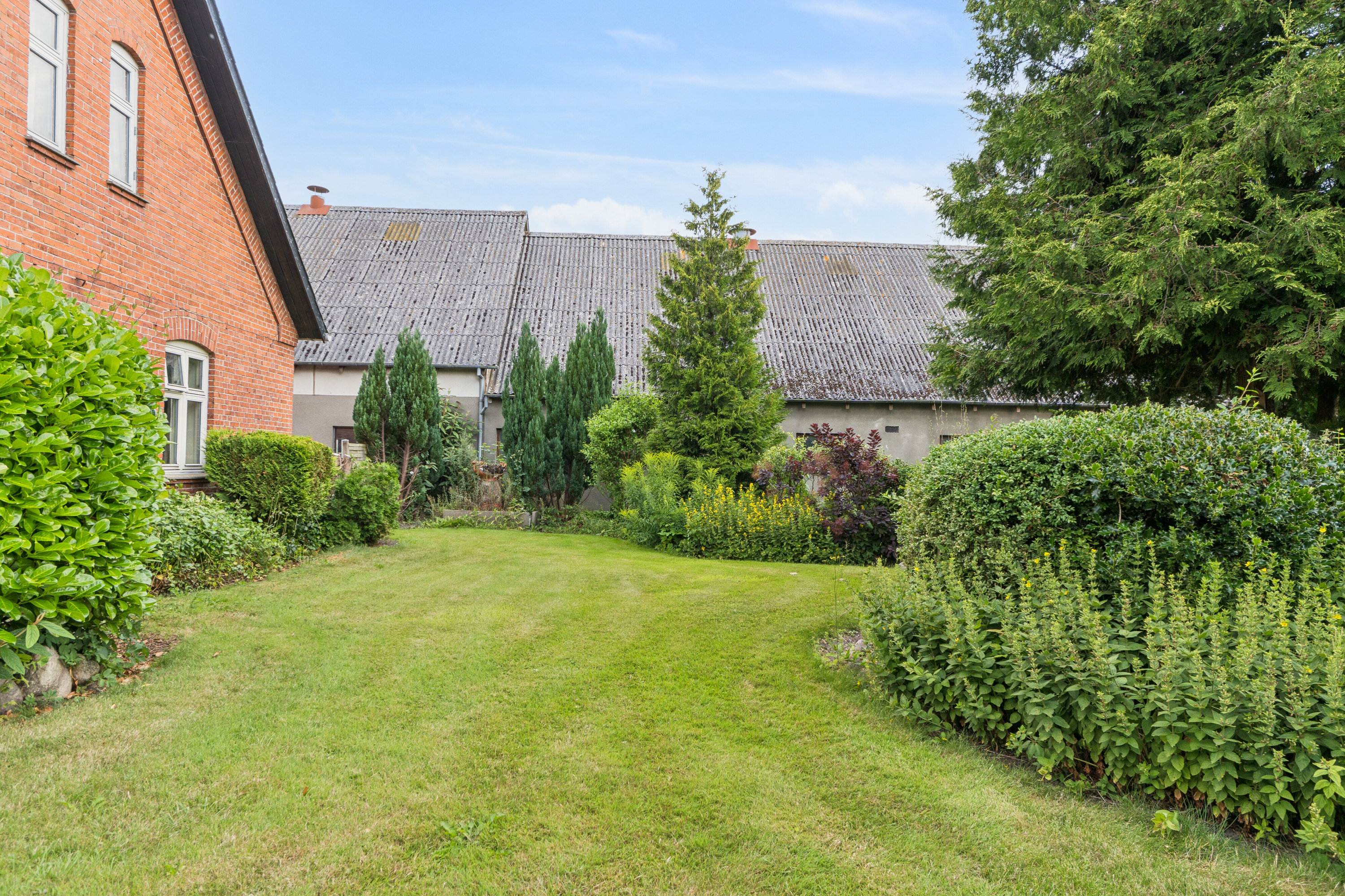 Fremhævet set fra haven billede i fuldskærmstilstand. Billede af Egensevej 32, Egense Mark, 5450 Otterup