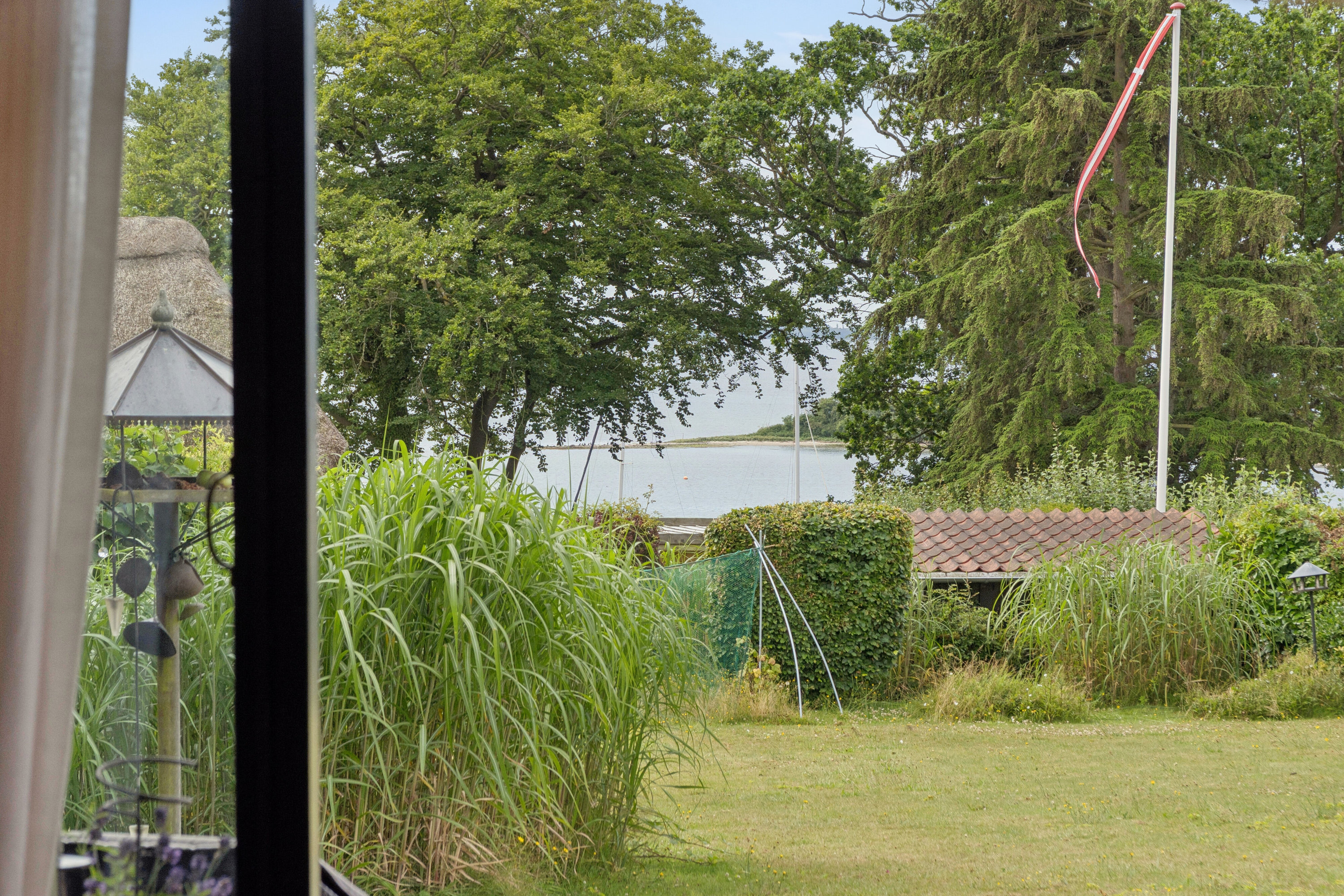 Fremhævet udendørs billede i fuldskærmstilstand. Billede af Baldersvænget 10, Thurø, 5700 Svendborg