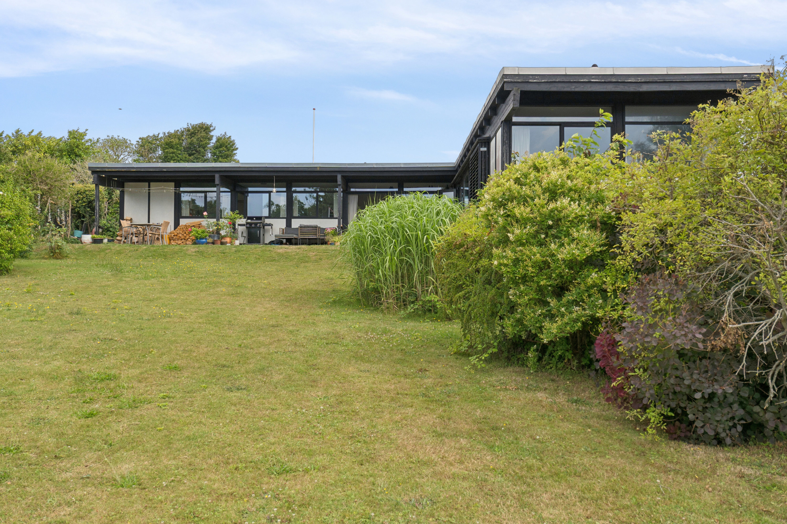 Fremhævet set fra haven billede i fuldskærmstilstand. Billede af Baldersvænget 10, Thurø, 5700 Svendborg