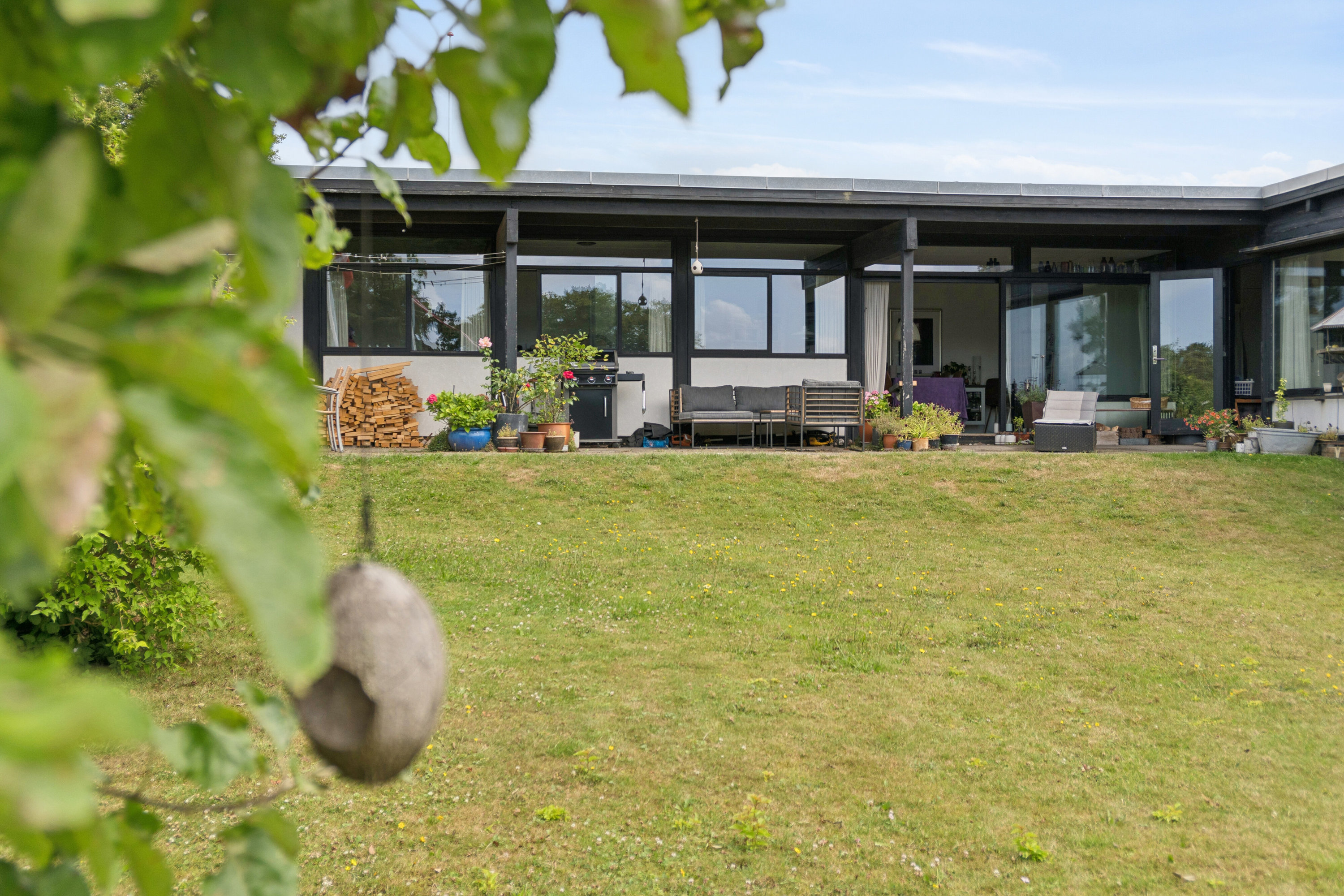 Fremhævet set fra haven billede i fuldskærmstilstand. Billede af Baldersvænget 10, Thurø, 5700 Svendborg