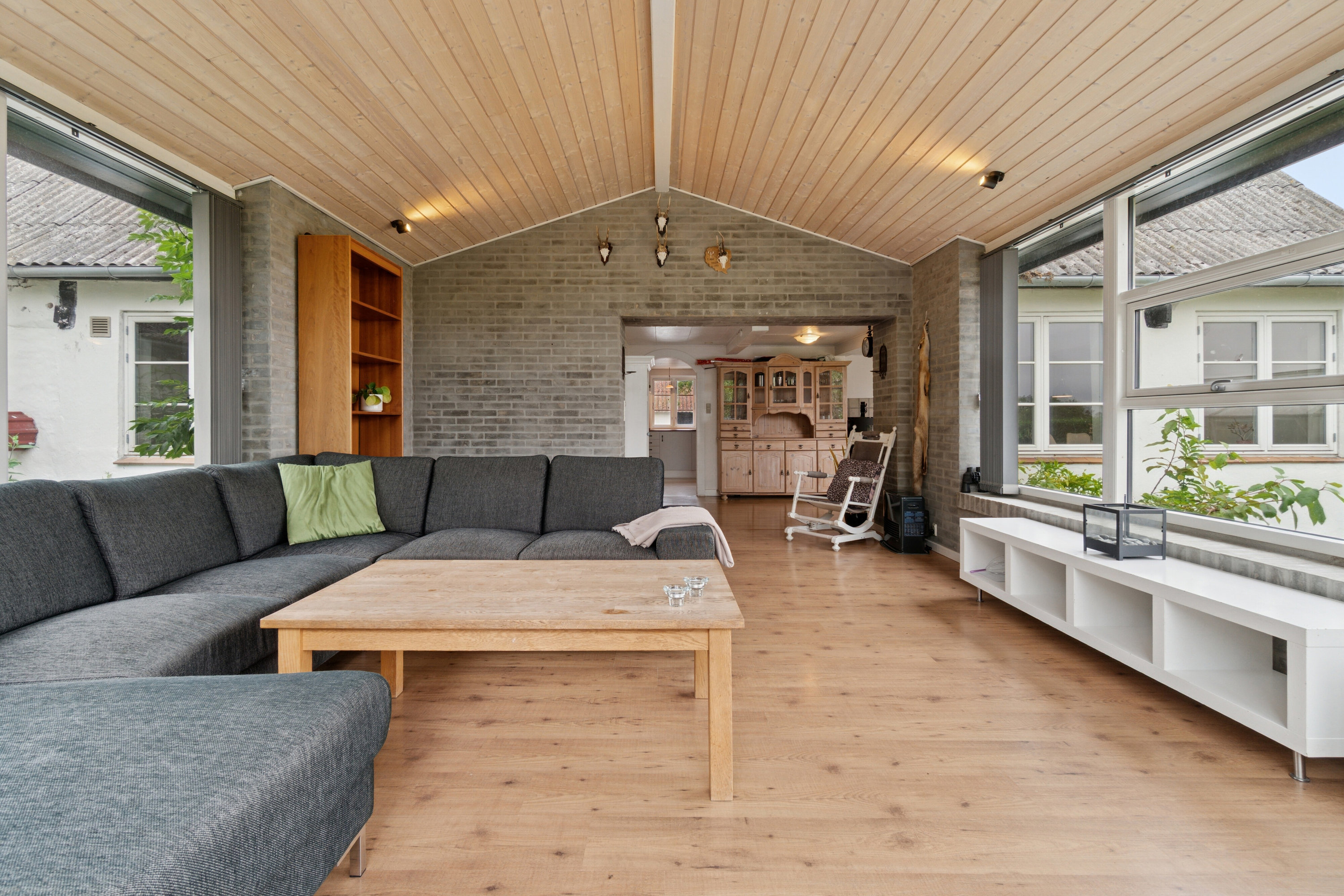 Fremhævet stue billede i fuldskærmstilstand. Billede af Savmøllevej 4, Østermarie, 3751 Østermarie