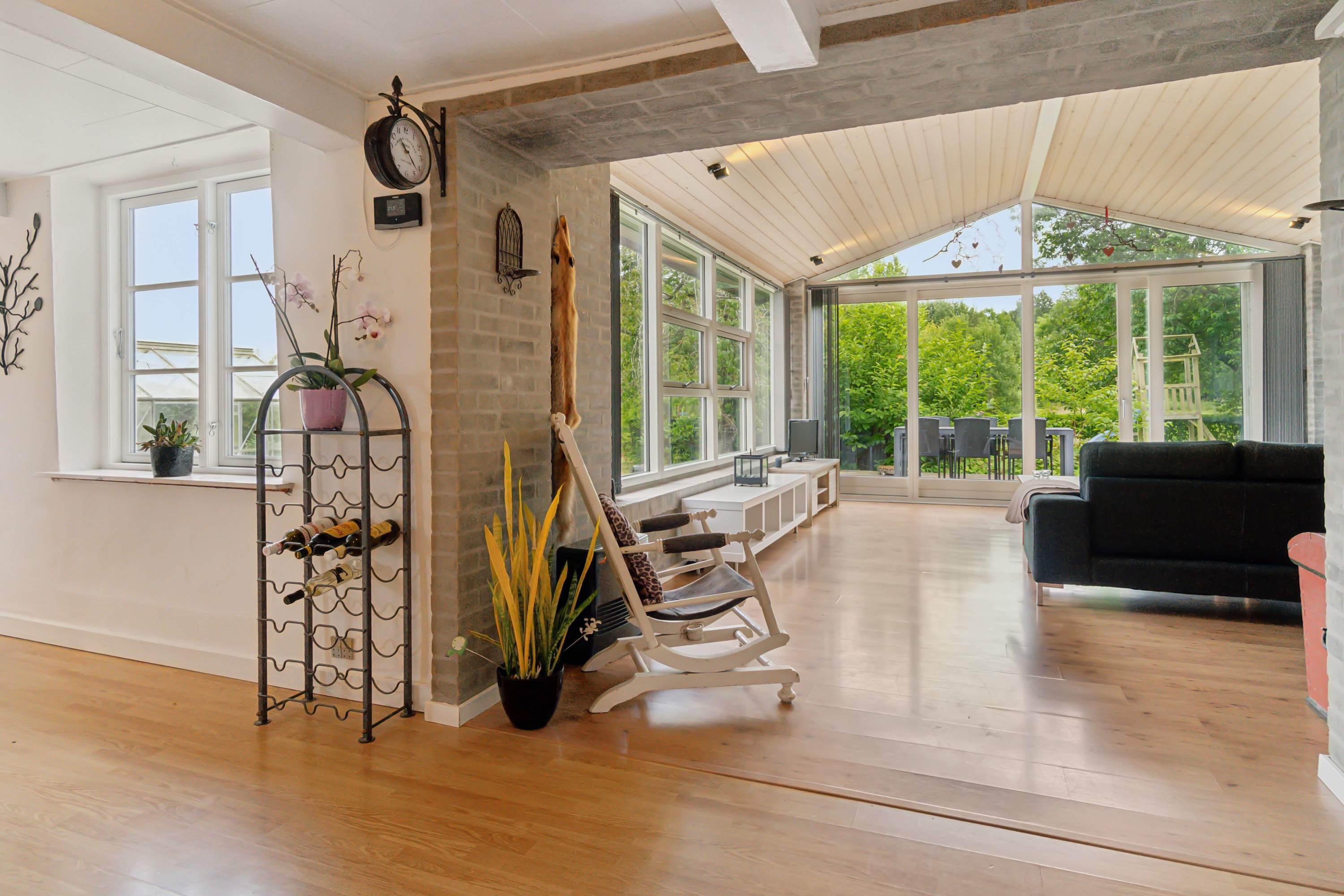 Fremhævet stue billede i fuldskærmstilstand. Billede af Savmøllevej 4, Østermarie, 3751 Østermarie