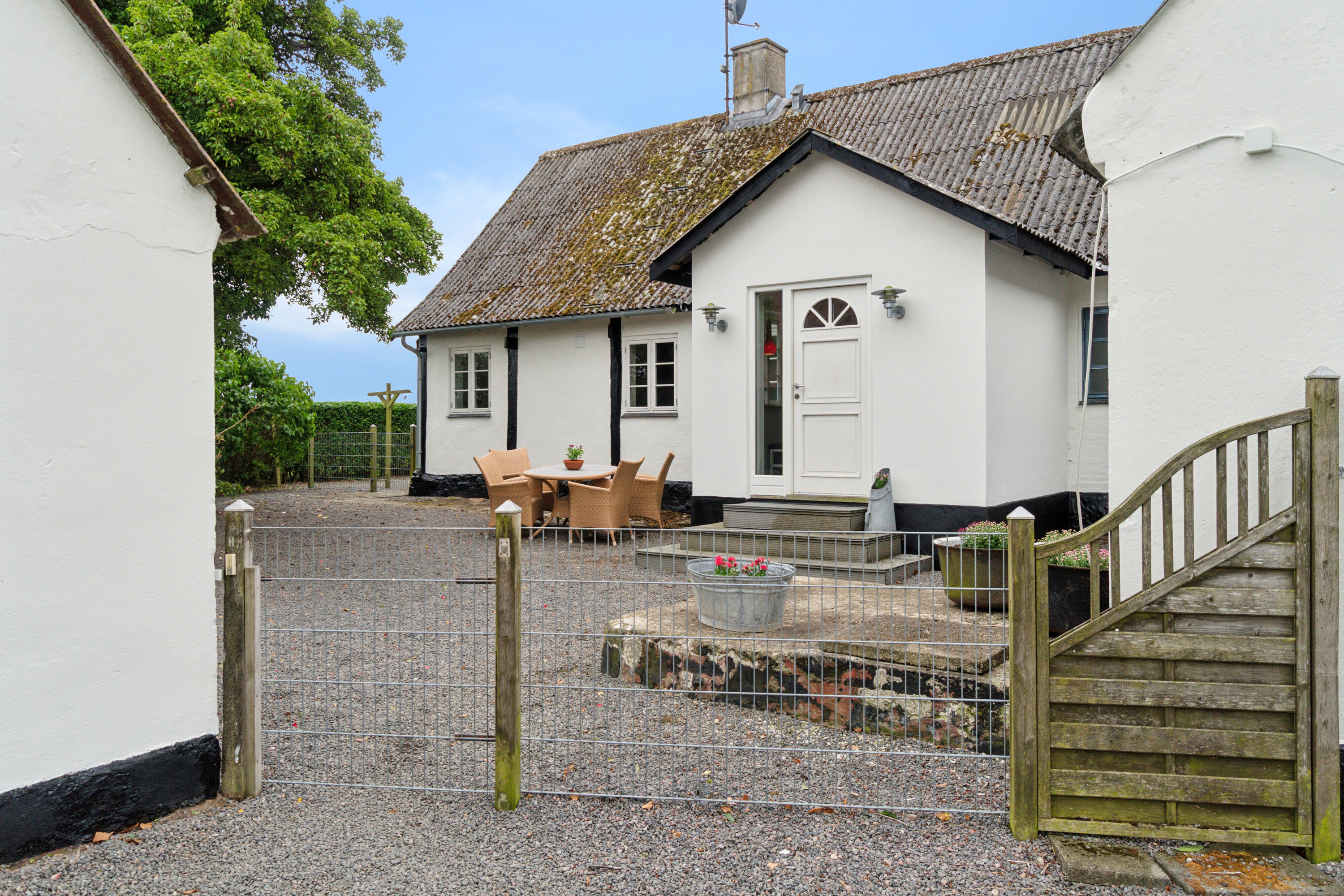 Fremhævet udendørs billede i fuldskærmstilstand. Billede af Savmøllevej 4, Østermarie, 3751 Østermarie