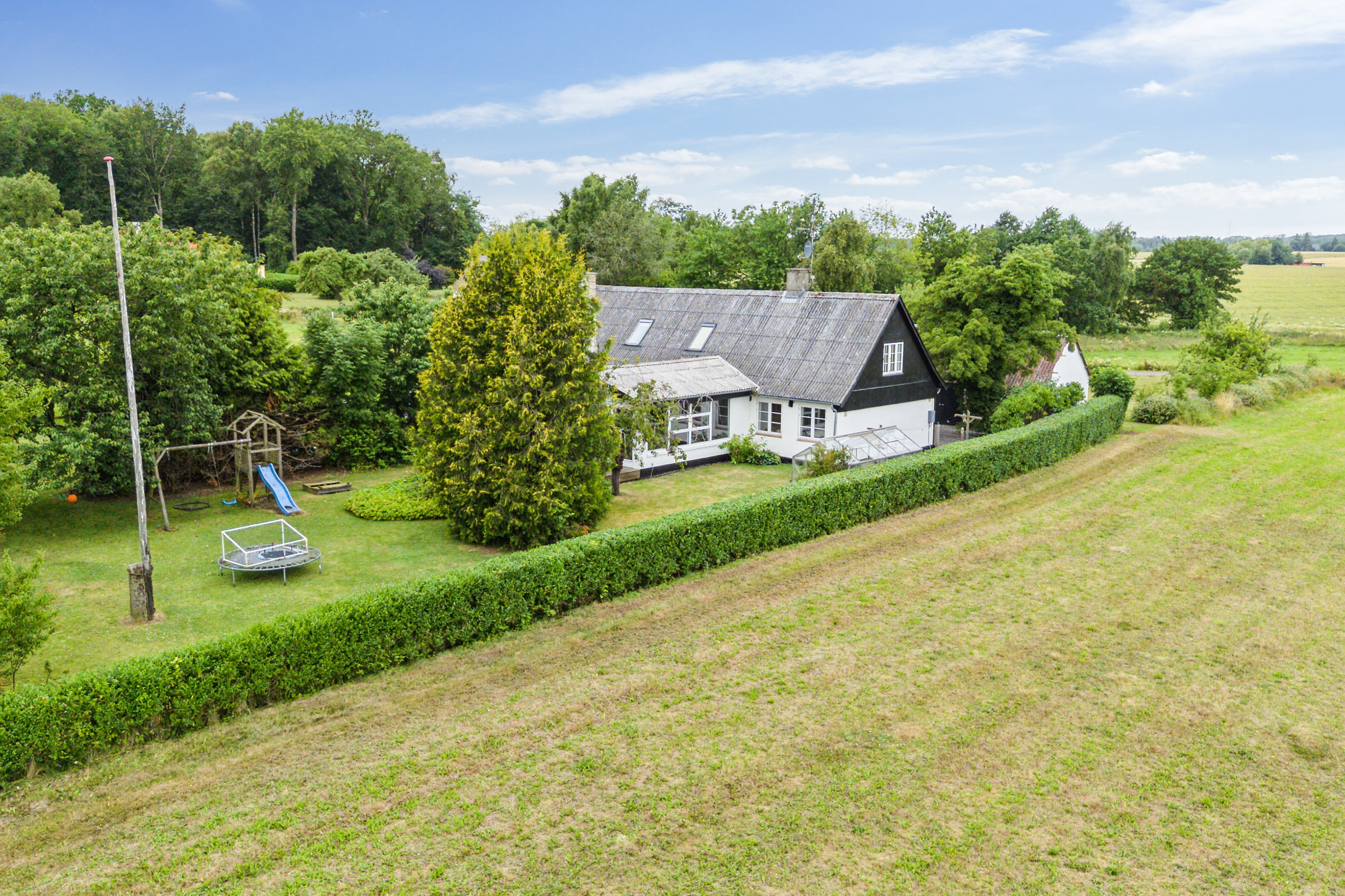 Fremhævet luftfoto billede i fuldskærmstilstand. Billede af Savmøllevej 4, Østermarie, 3751 Østermarie