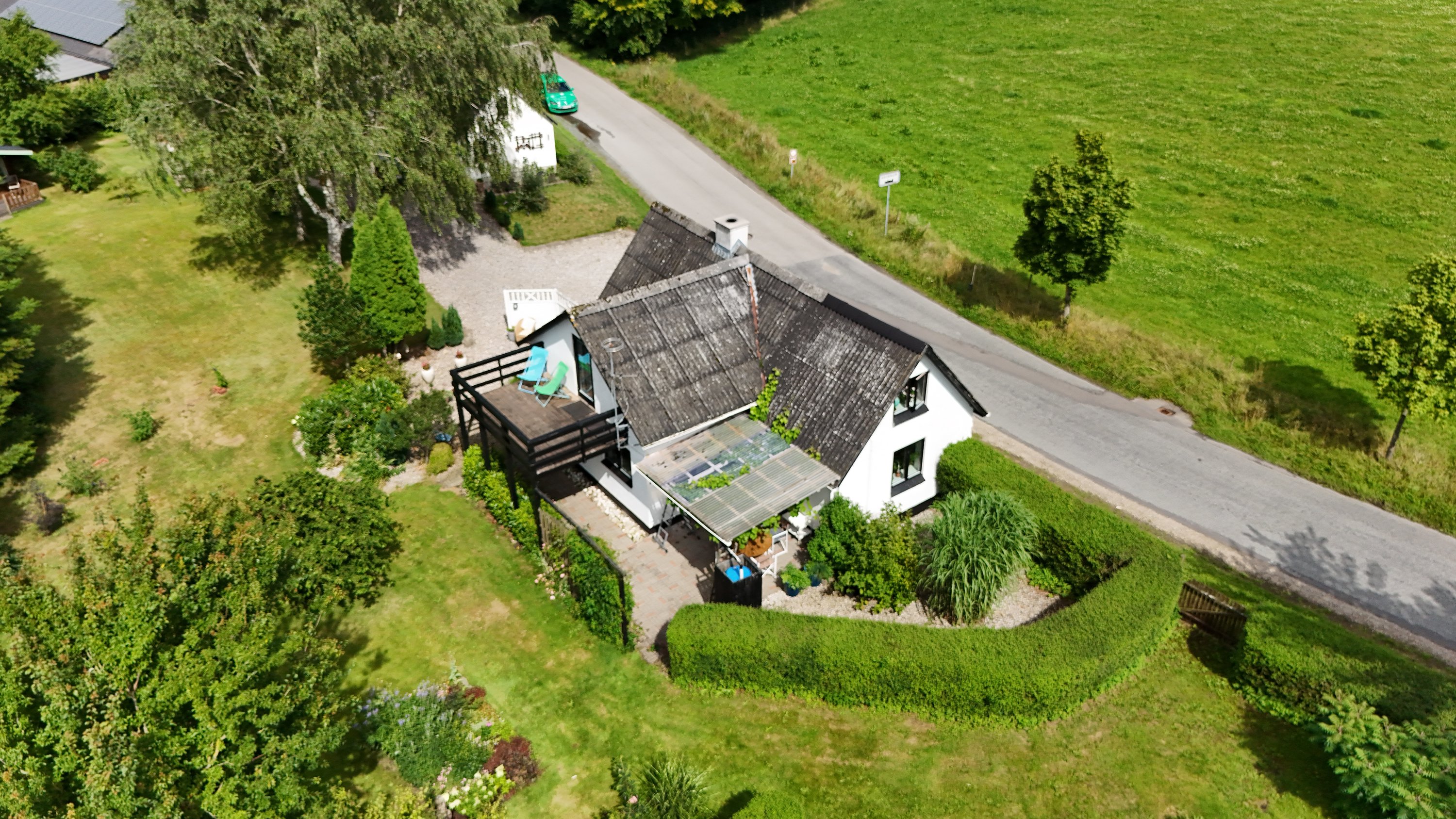 Fremhævet dronefoto billede i fuldskærmstilstand. Billede af Lindumvej 6, Hvornum, 9500 Hobro