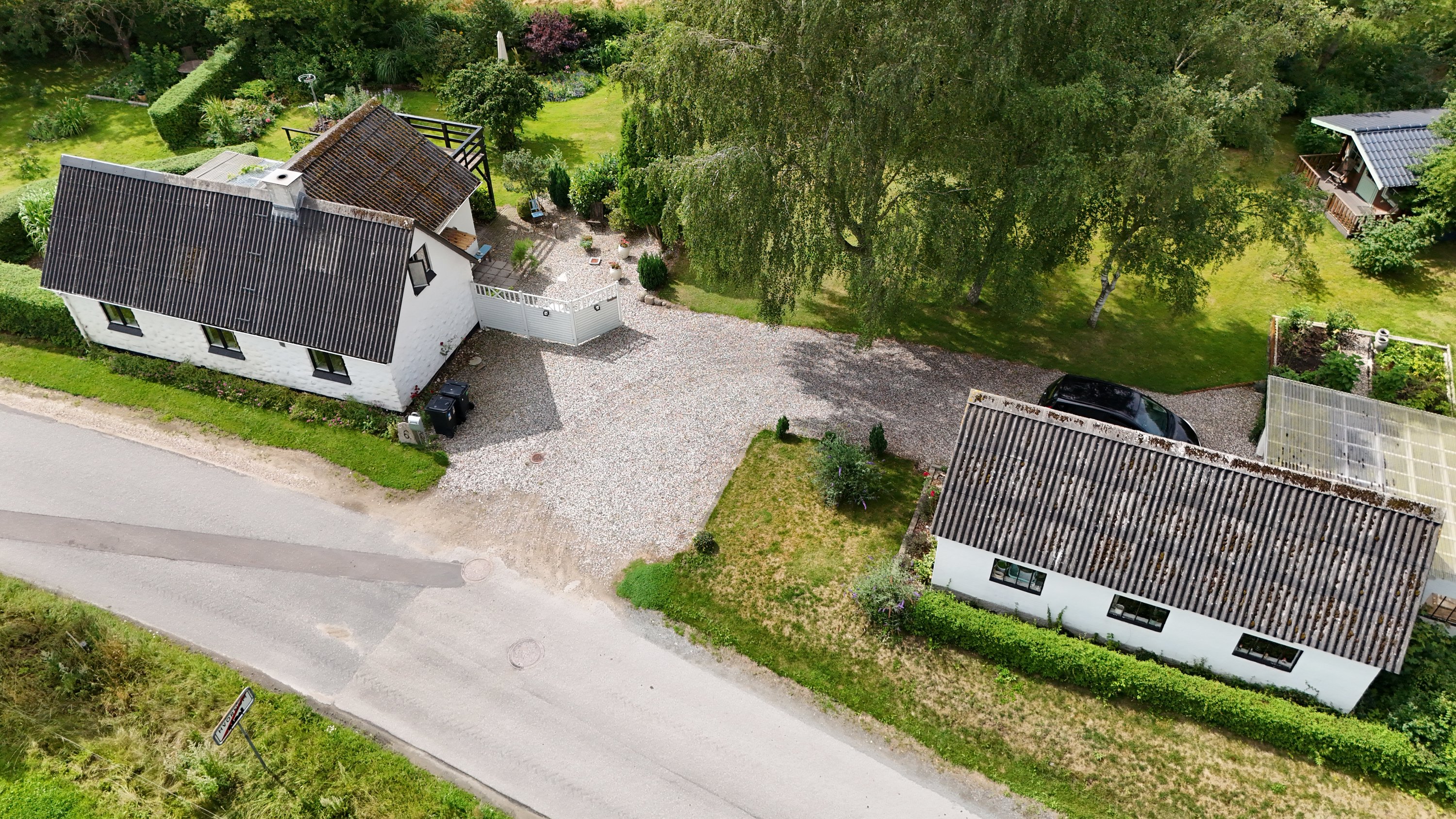 Fremhævet dronefoto billede i fuldskærmstilstand. Billede af Lindumvej 6, Hvornum, 9500 Hobro