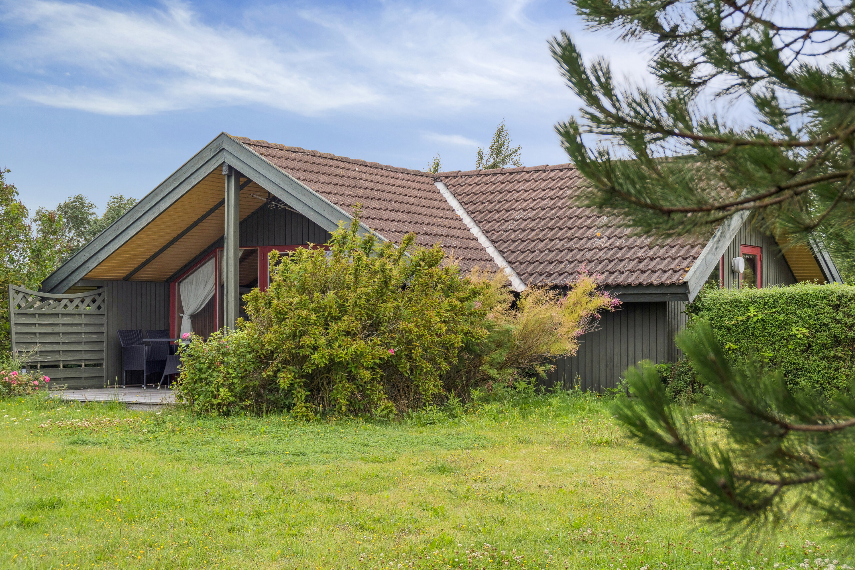 Fremhævet set fra haven billede i fuldskærmstilstand. Billede af Mimersvej 18, Drøsselbjerg, 4200 Slagelse