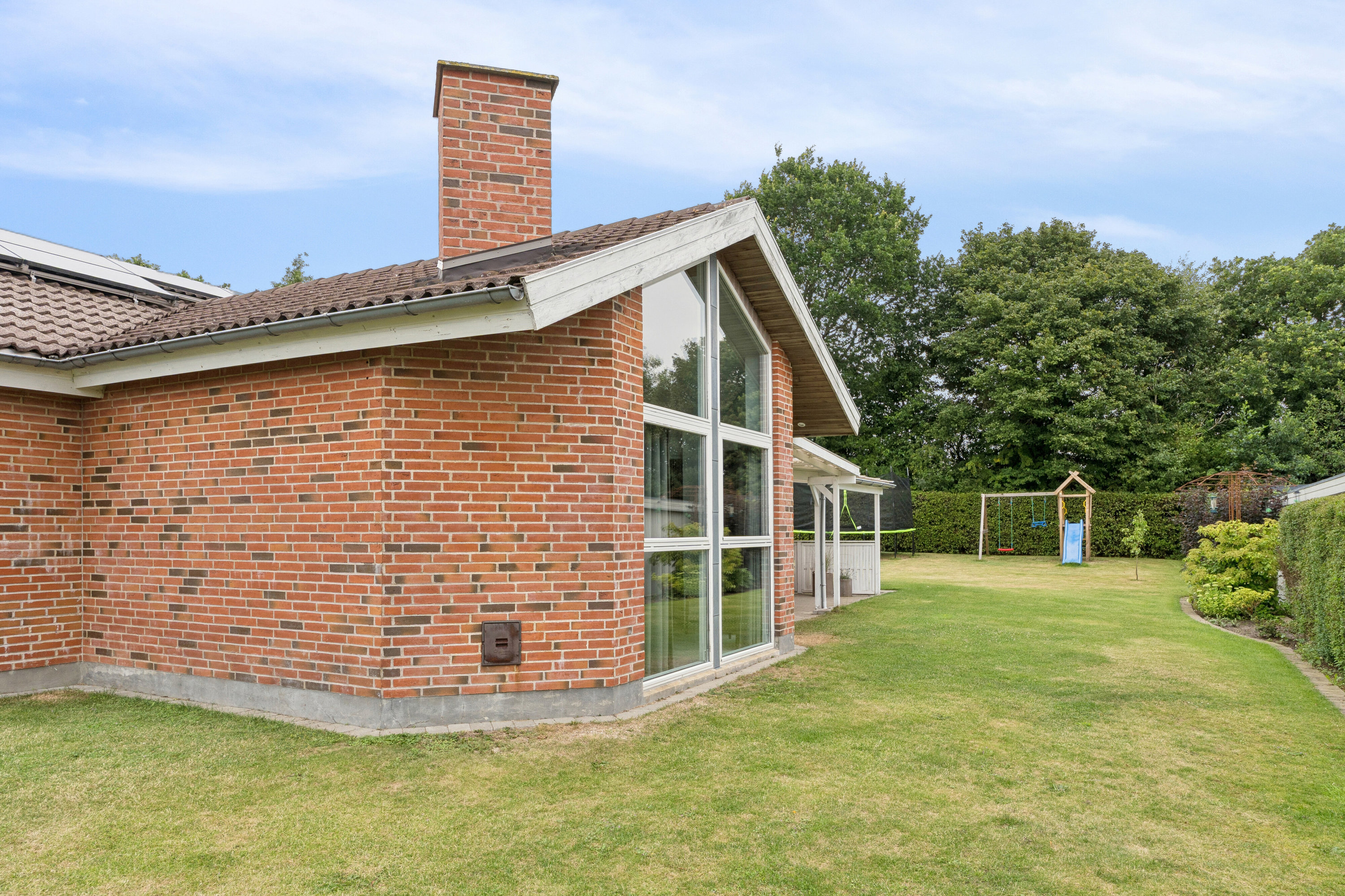 Fremhævet set fra haven billede i fuldskærmstilstand. Billede af Leonora Christinas Vej 19, 7430 Ikast