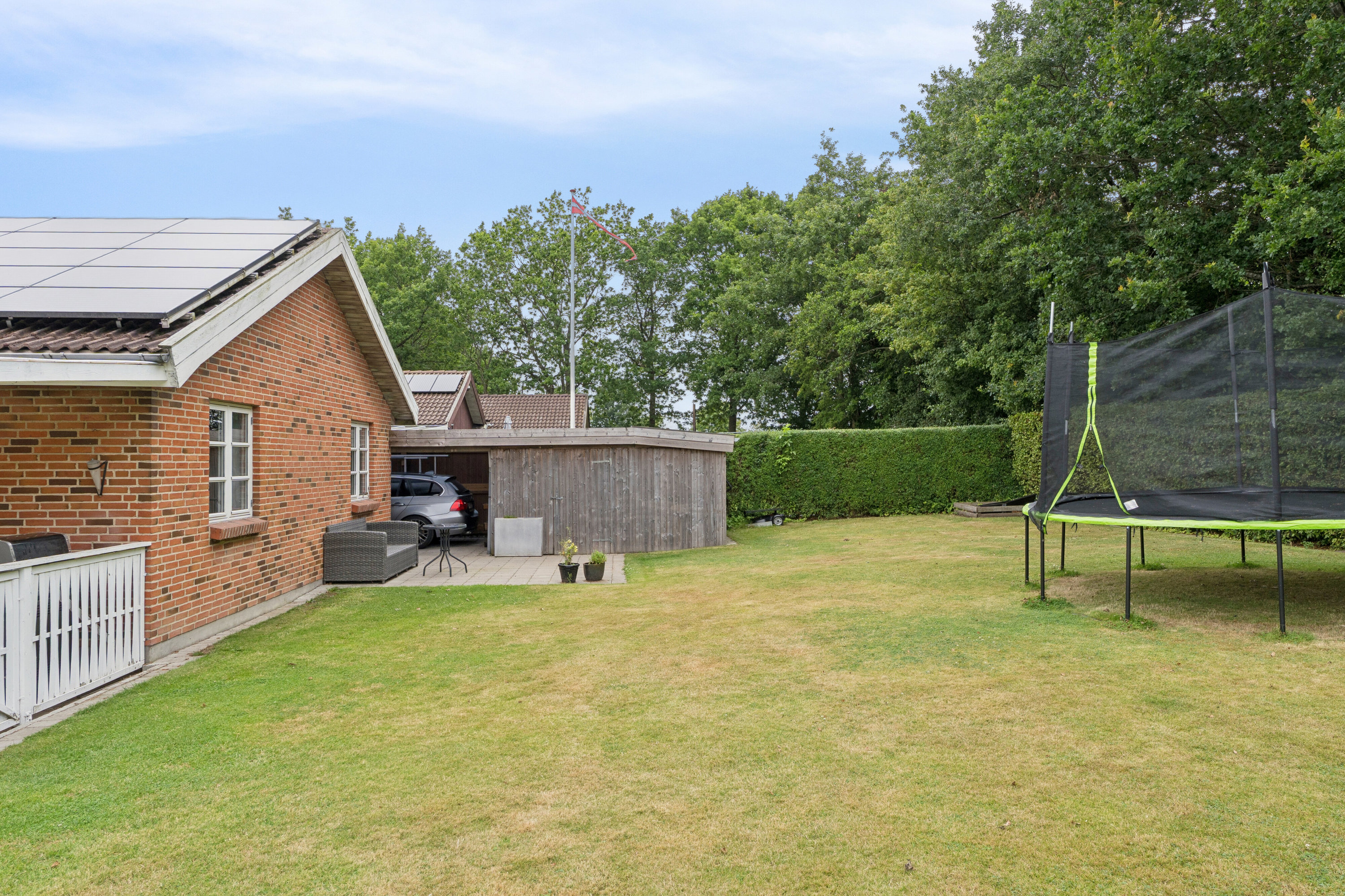 Fremhævet set fra haven billede i fuldskærmstilstand. Billede af Leonora Christinas Vej 19, 7430 Ikast