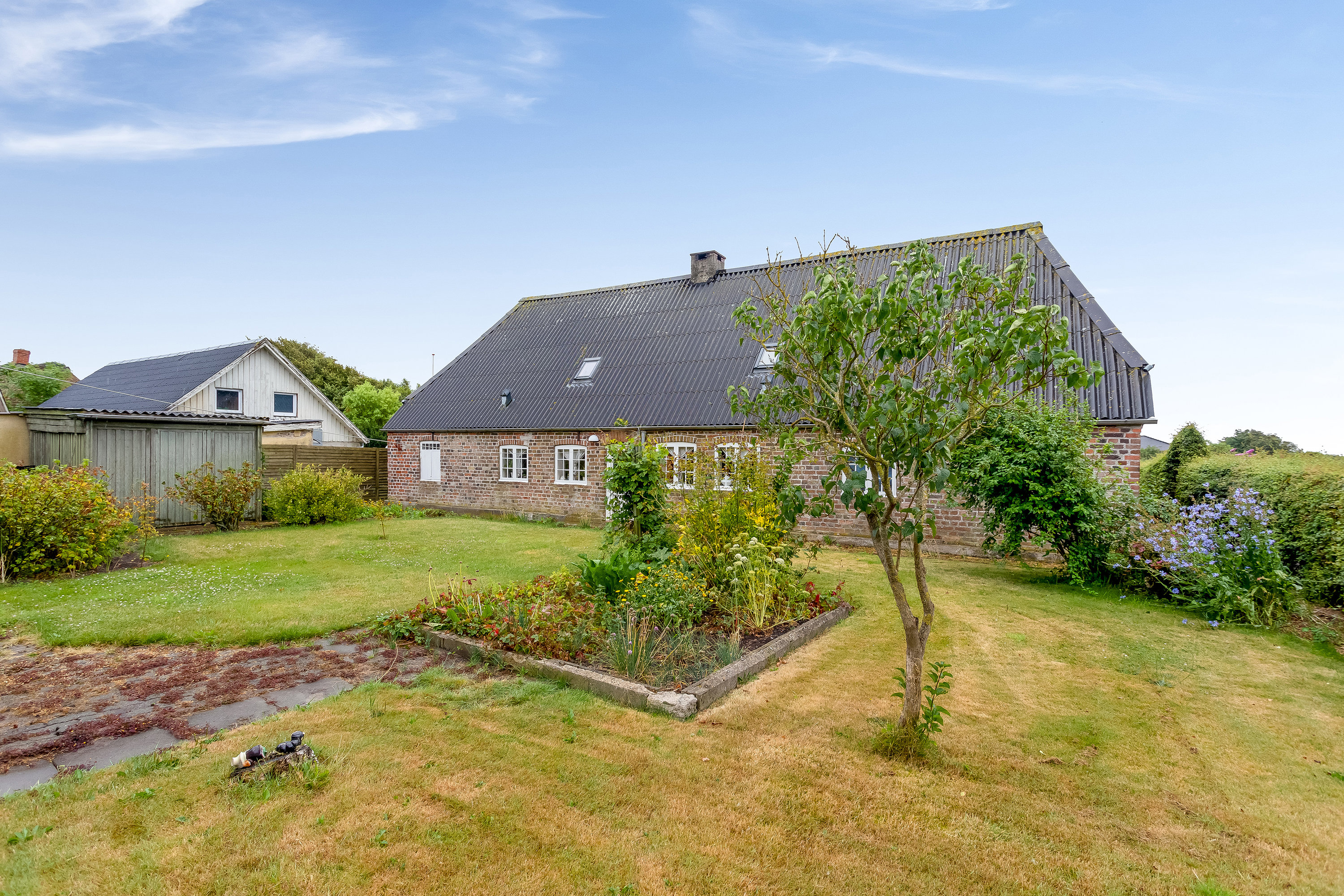 Fremhævet facade billede i fuldskærmstilstand. Billede af Søndervej 8, Emmerlev, 6280 Højer