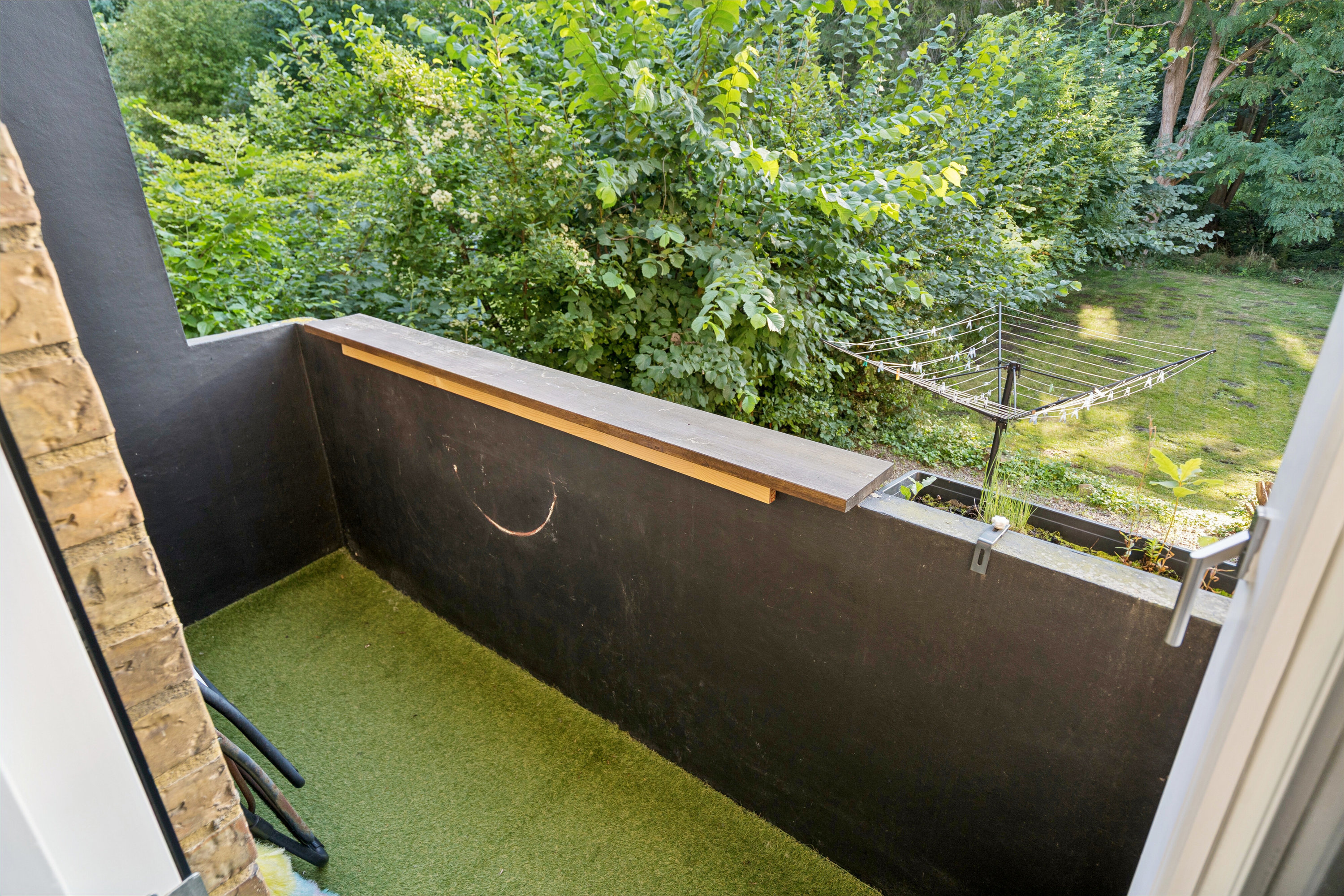 Fremhævet altan billede i fuldskærmstilstand. Billede af Åløkkehaven 62, st.. th., 5000 Odense C