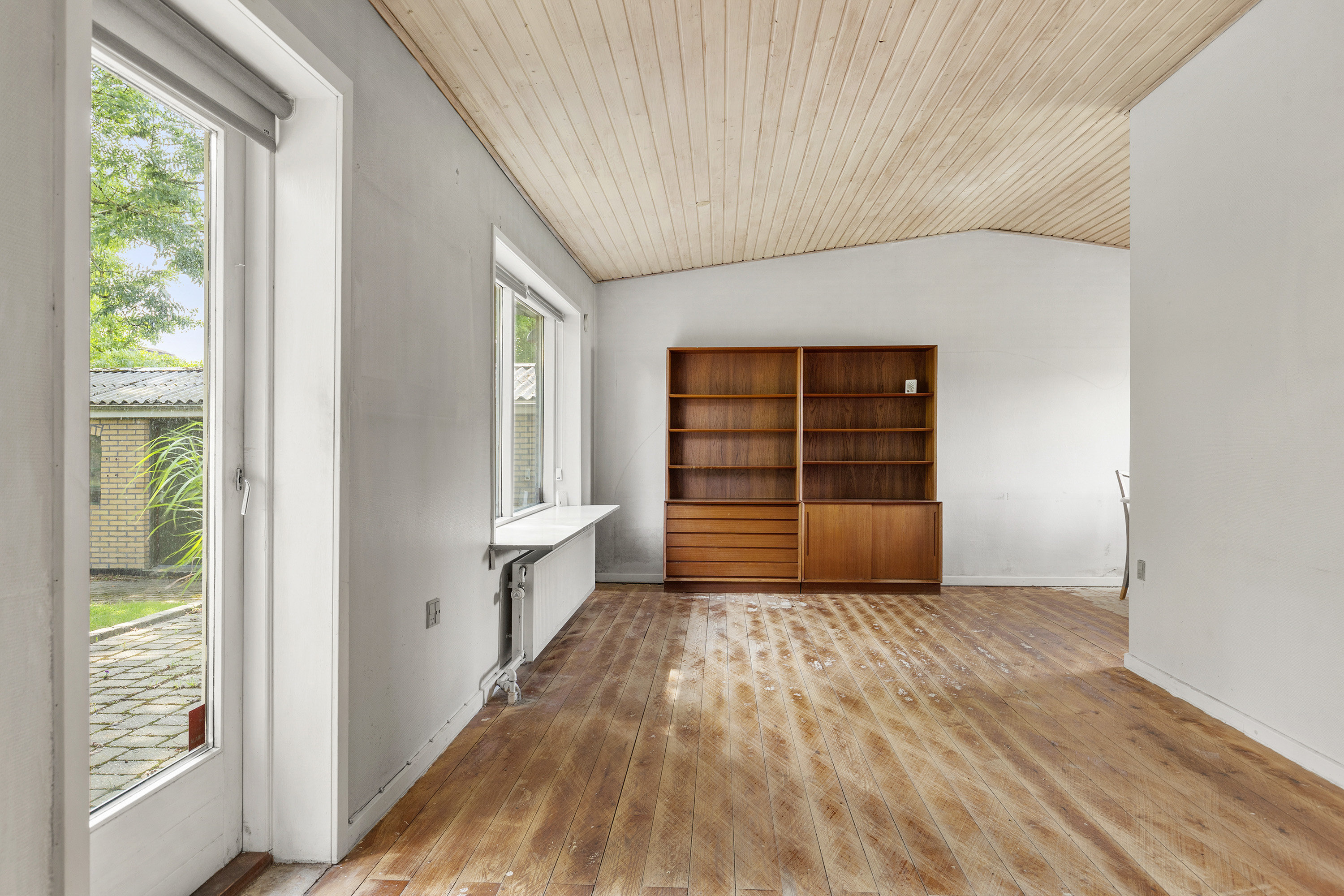 Fremhævet stue billede i fuldskærmstilstand. Billede af Rønnevej 2, 9620 Aalestrup