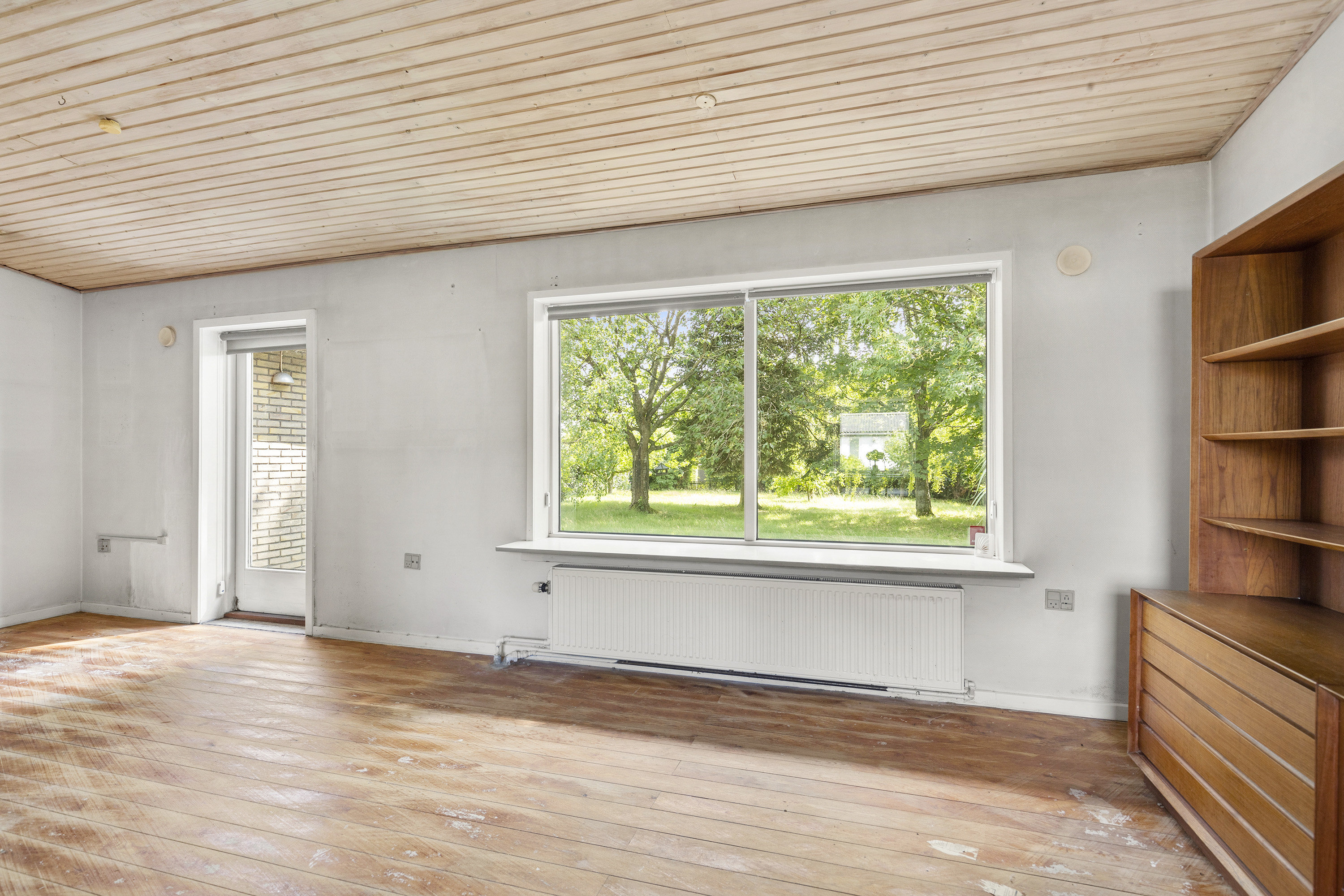 Fremhævet stue billede i fuldskærmstilstand. Billede af Rønnevej 2, 9620 Aalestrup