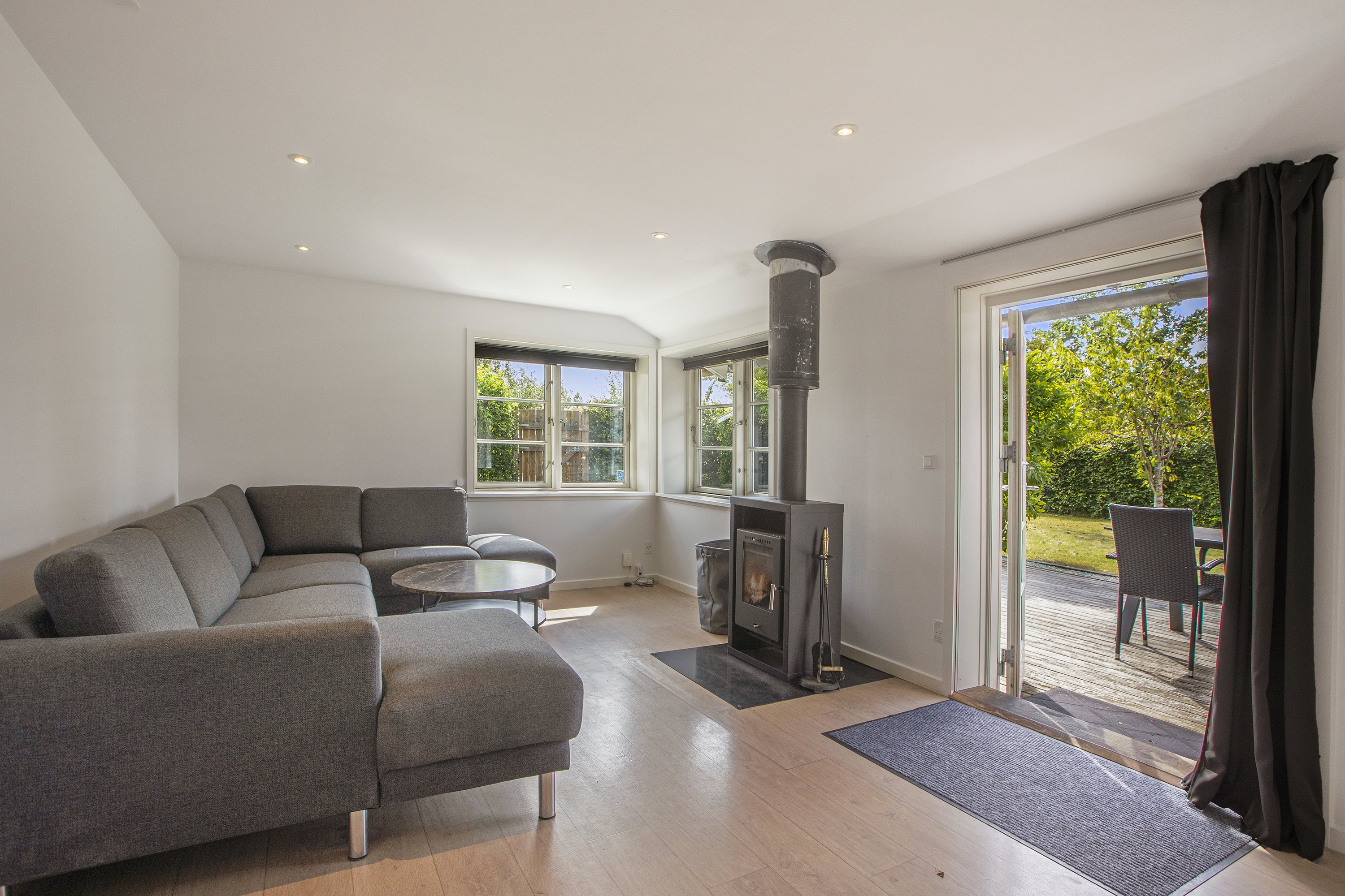 Fremhævet stue billede i fuldskærmstilstand. Billede af Bjarkesvej 1, 2740 Skovlunde