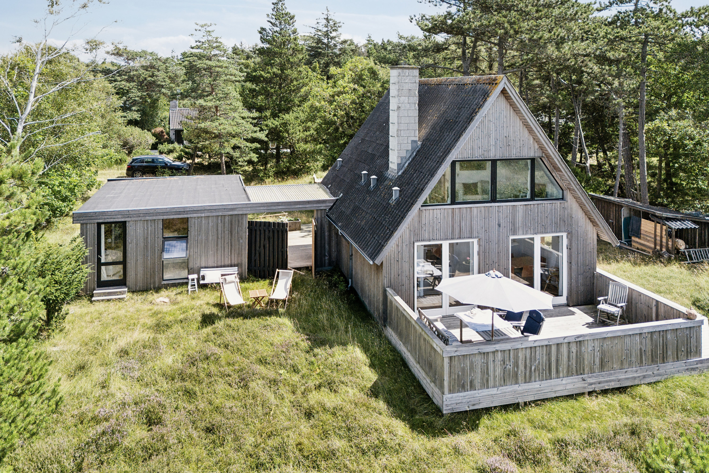 Fremhævet set fra haven billede i fuldskærmstilstand. Billede af Lysholmparken 53, Gudmindrup Lyng, 4573 Højby