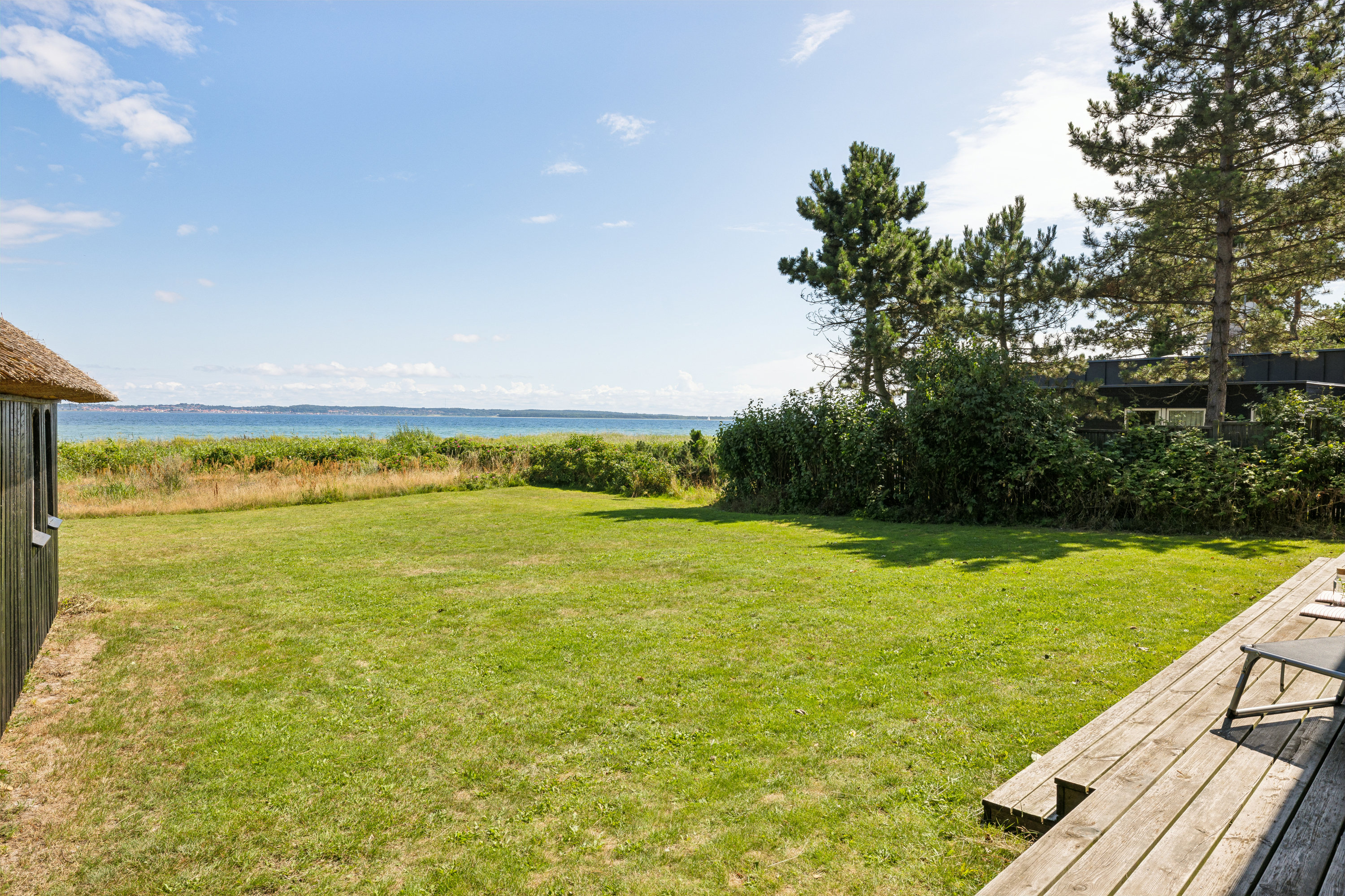 Miniaturebillede 1: have. Billede af Bogenshovedvej 7, Bogens Strand, 8400 Ebeltoft