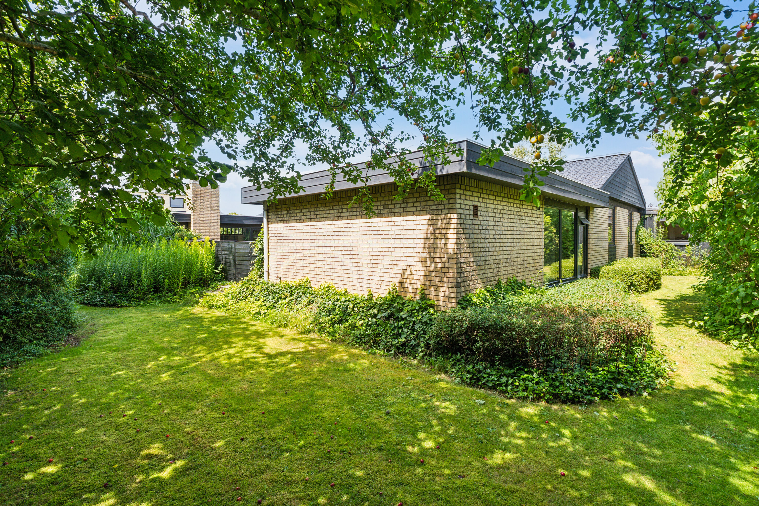 Fremhævet set fra haven billede i fuldskærmstilstand. Billede af Grønlundsvej 6, 4760 Vordingborg