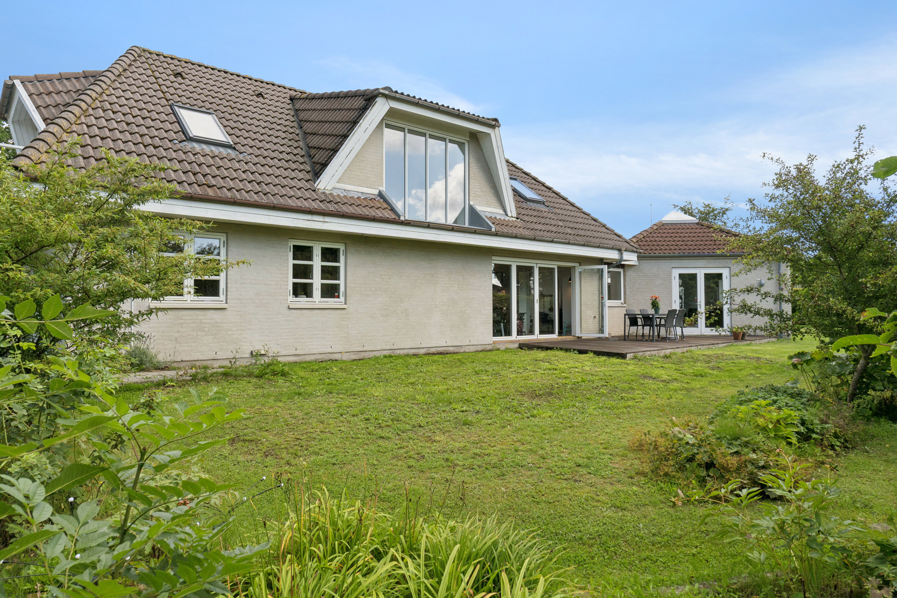 Fremhævet set fra haven billede i fuldskærmstilstand. Billede af Stenbukken 48, 5700 Svendborg