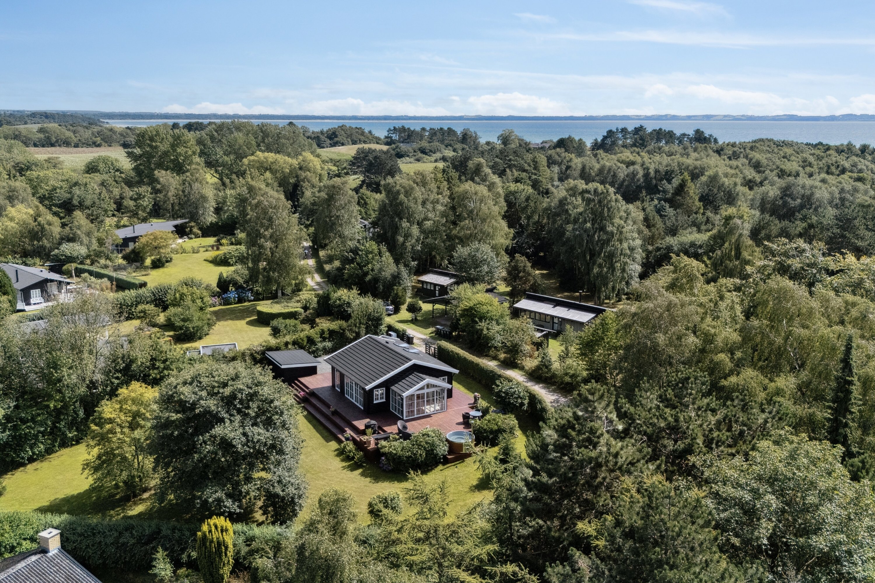 Fremhævet luftfoto billede i fuldskærmstilstand. Billede af Strandmosevej 15, Ebbeløkke, 4500 Nykøbing Sj
